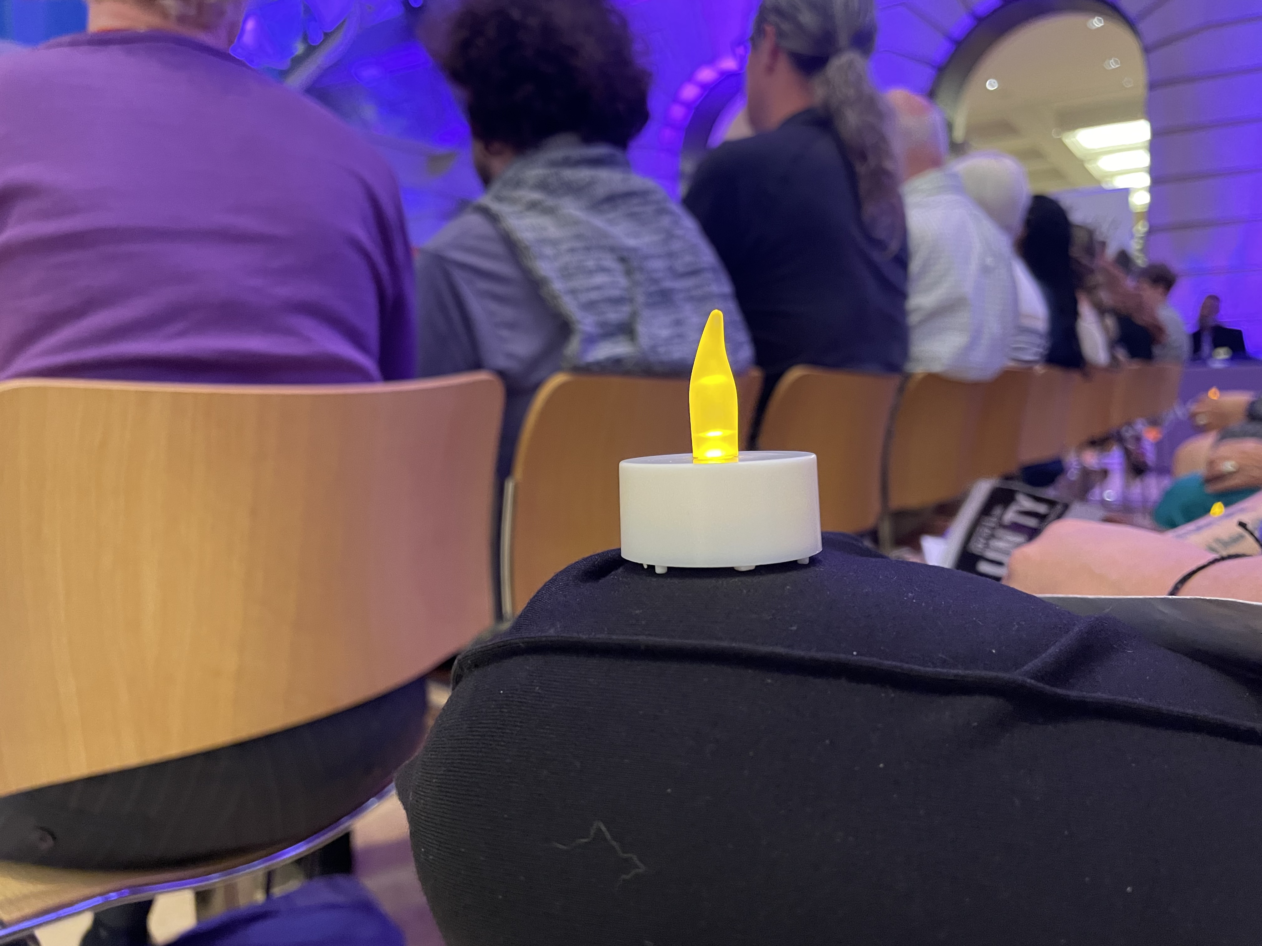 Norfolk candlelight vigil honors domestic violence victims and survivors