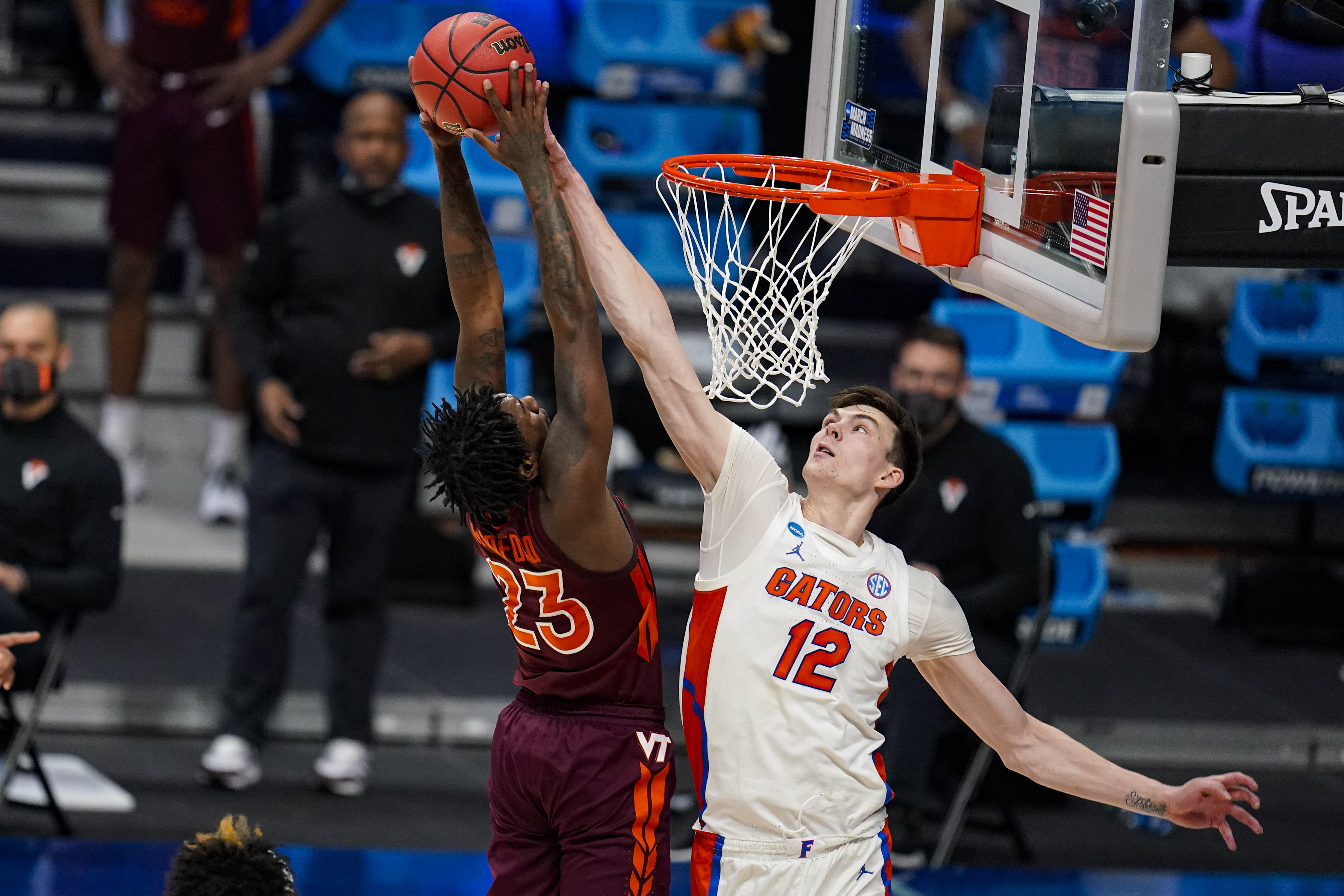 Florida Gators forward Colin Castleton blocks shot of Virginia Tech Hokies guard Tyrece Radford in 2021 NCAA tournament