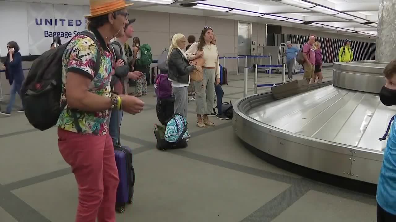 United Airlines passengers fleeing Maui wildfires land at DIA.jpg