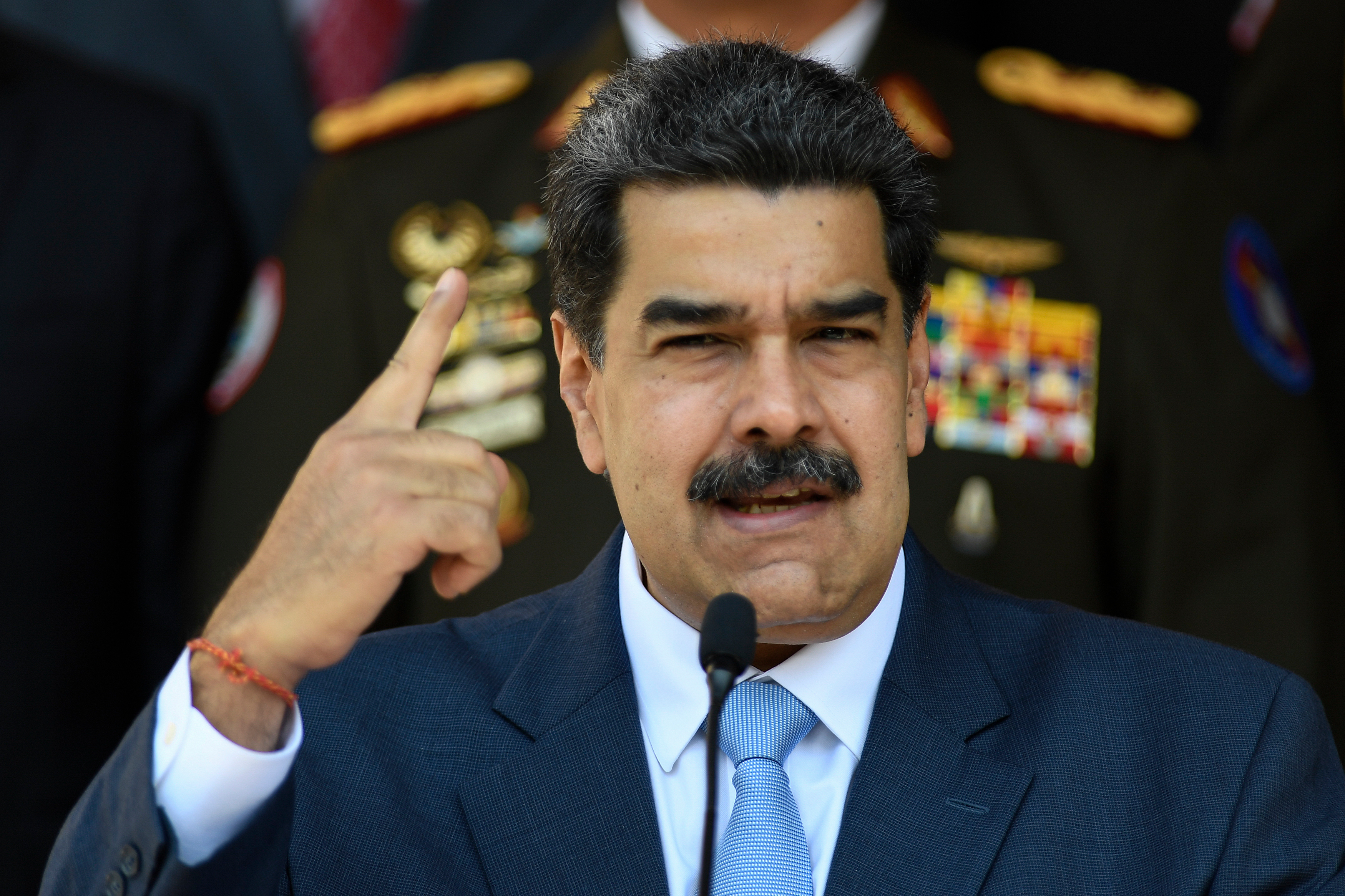 FILE - Venezuelan President Nicolas Maduro gives a press conference at the Miraflores presidential palace, March 12, 2020, in Caracas, Venezuela.