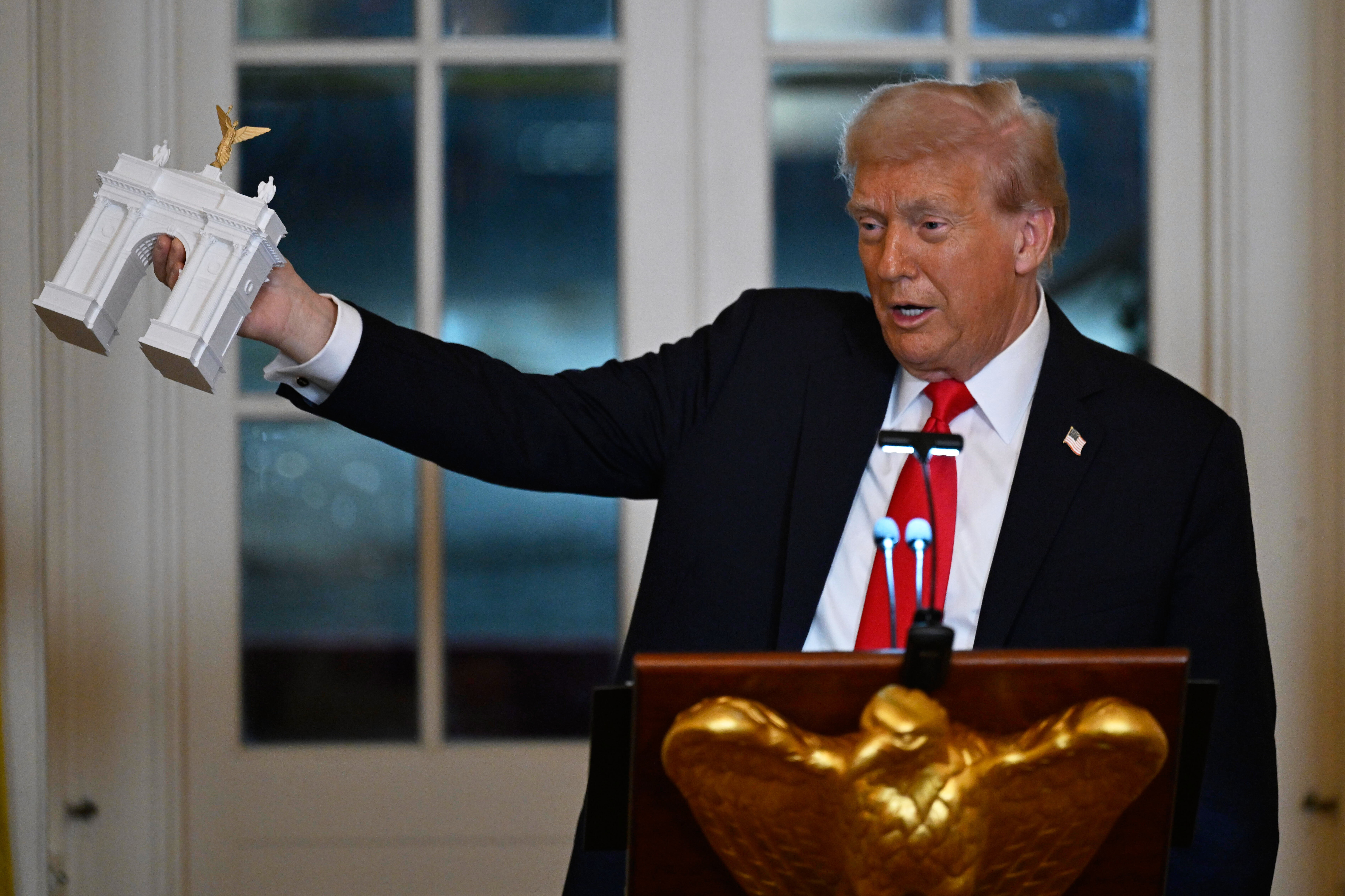 President Donald Trump addresses a dinner for donors who have contributed to build the new ballroom at the White House, Wednesday, Oct. 15, 2025, in Washington. 