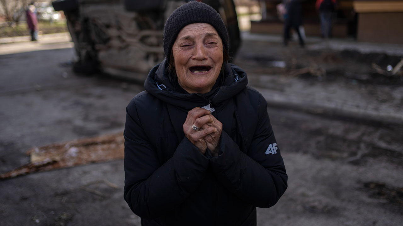 Tanya Nedashkivs'ka, 57, mourns the death of her husband who was killed in Bucha, on the outskirts of Kyiv, Ukraine, Monday, April 4, 2022.