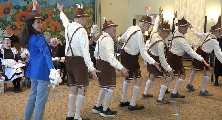 Katie dancing with residents at Renaissance Retirement Campus 