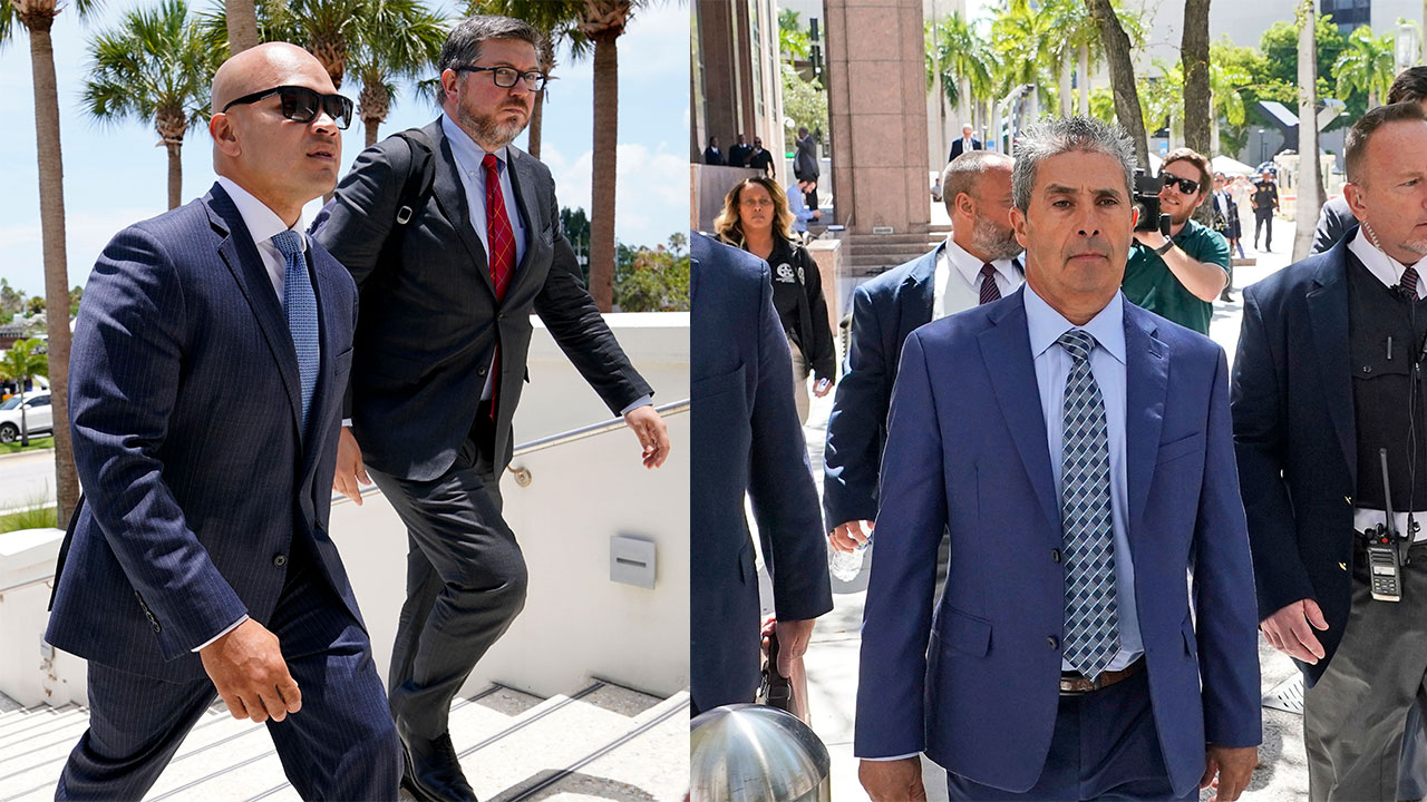 Walt Nauta and Carlos De Oliveira enter court in July 2023