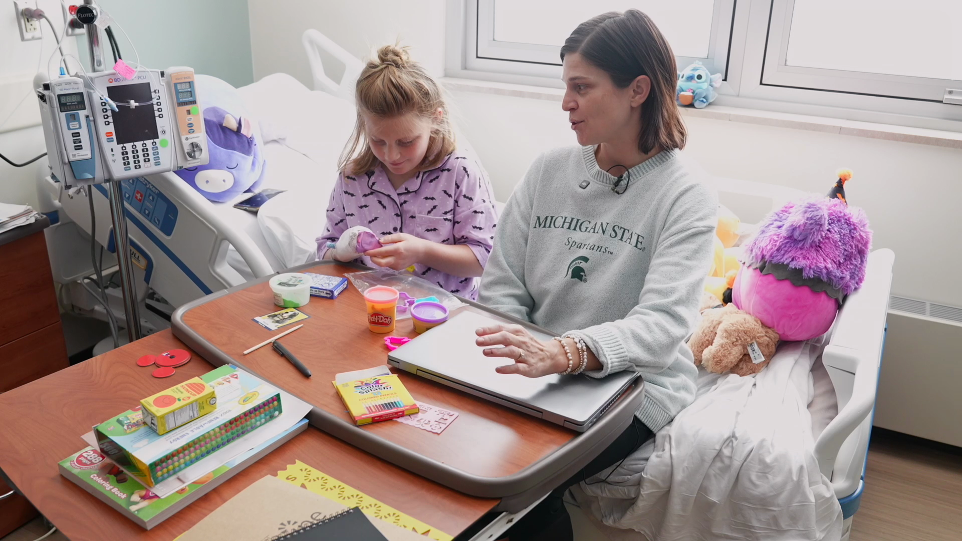 Michigan State football captains bring joy to young patients at Sparrow Hospital