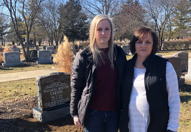 family by headstone.png