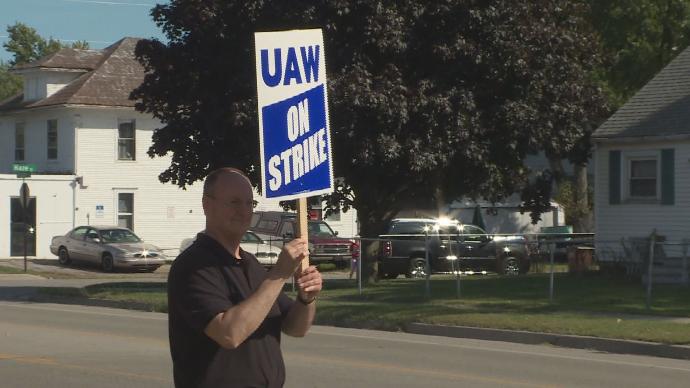 Sexton teacher Victor Celentino joins the picketing UAW workers at local 602.