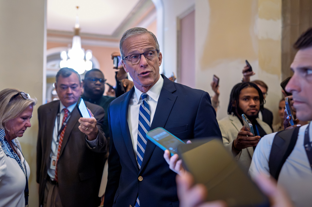 Senate Majority Leader John Thune, R-S.D., pauses for questions from reporters before votes on the immigration enforcement funding package, at the Capitol in Washington, Thursday, June 4, 2026.