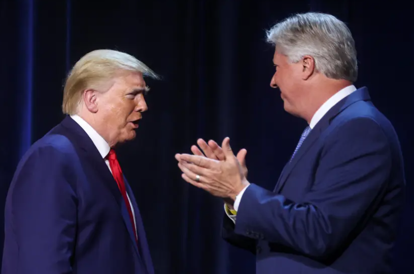 U.S. President Donald Trump is greeted by Pastor Robert Morris as he arrives for a roundtable discussion with members of the faith community, law enforcement and small business at Gateway Church Dallas Campus in Dallas