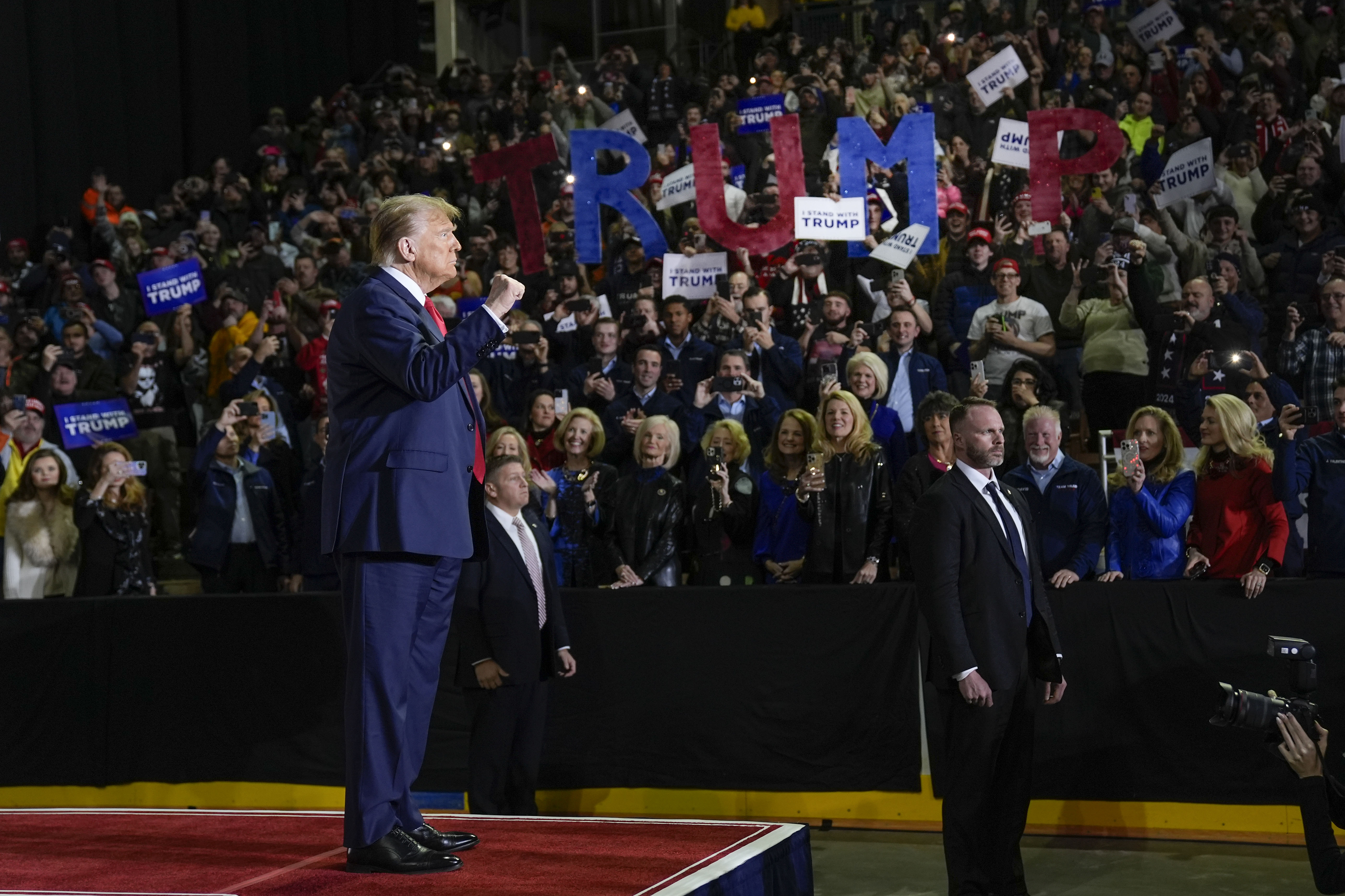 Republican presidential candidate former President Donald Trump gestures to the crowd during a campaign event in Manchester, N.H., Saturday, Jan. 20, 2024. (AP Photo/Matt Rourke)