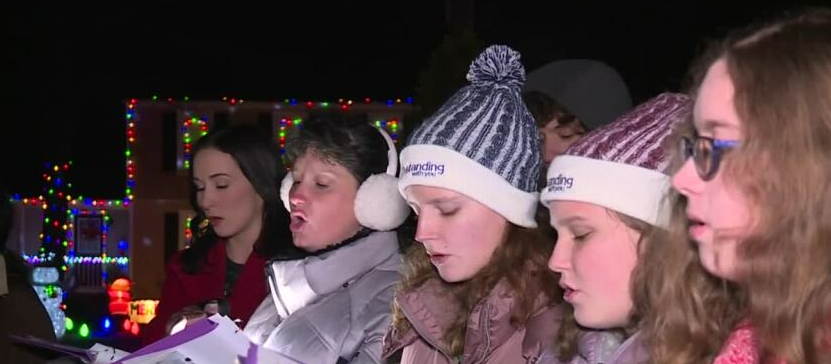 Students carol for a cause: 'This is a new tradition for us'