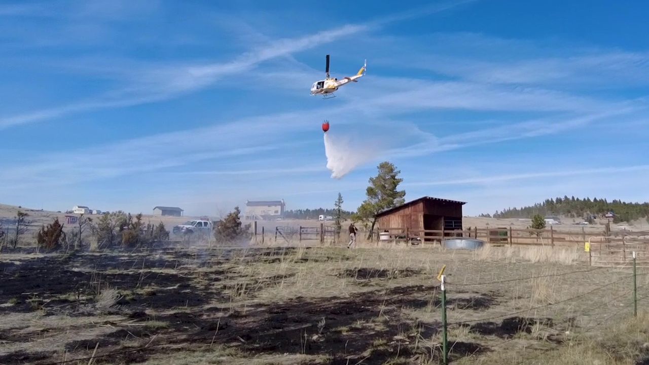 Crews tackle wildfire NW of Helena