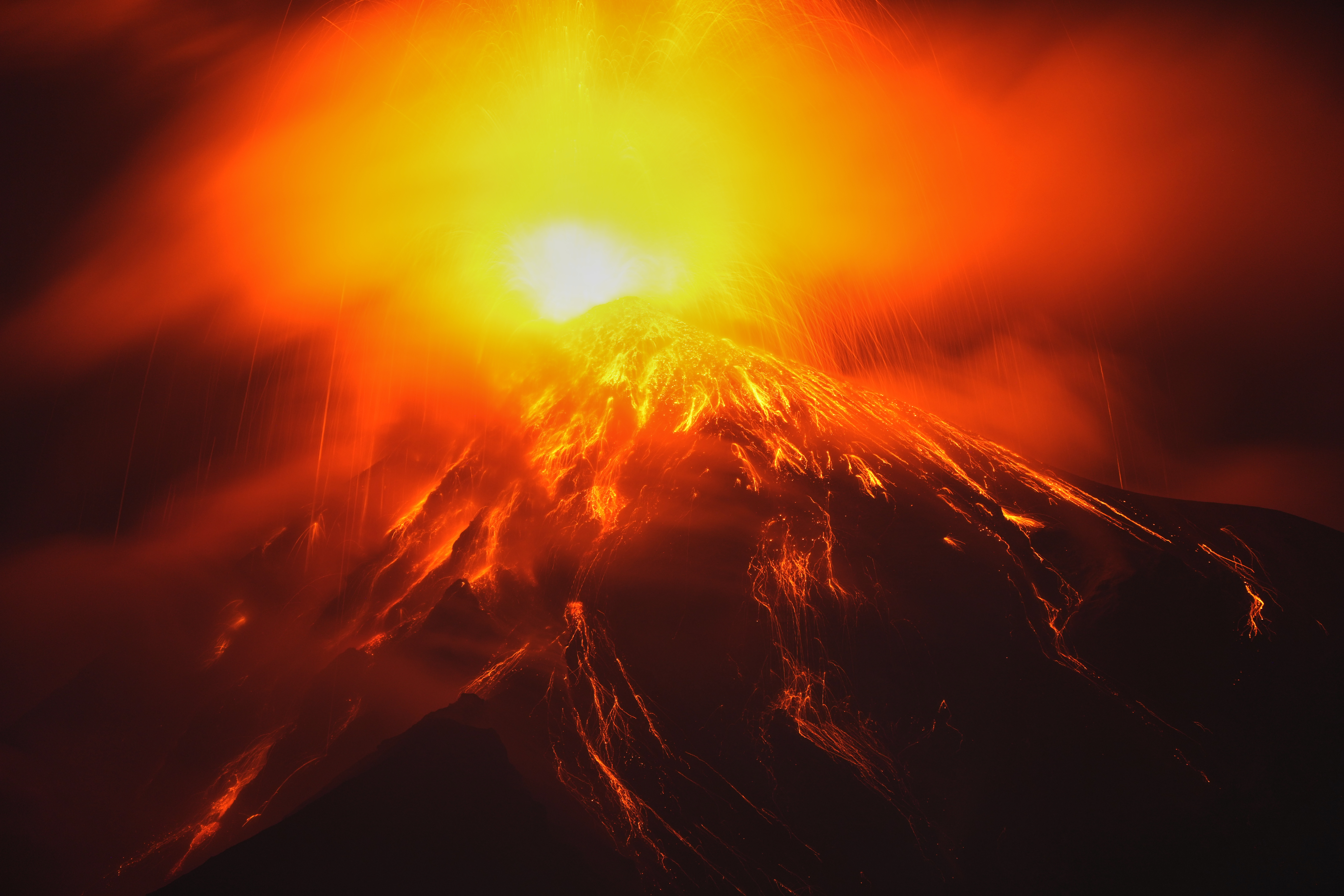 Lava flows out of the crater of the Fuego Volcano, as seen from San Juan Alotenango, Guatemala, Tuesday, Aug. 4, 2026.