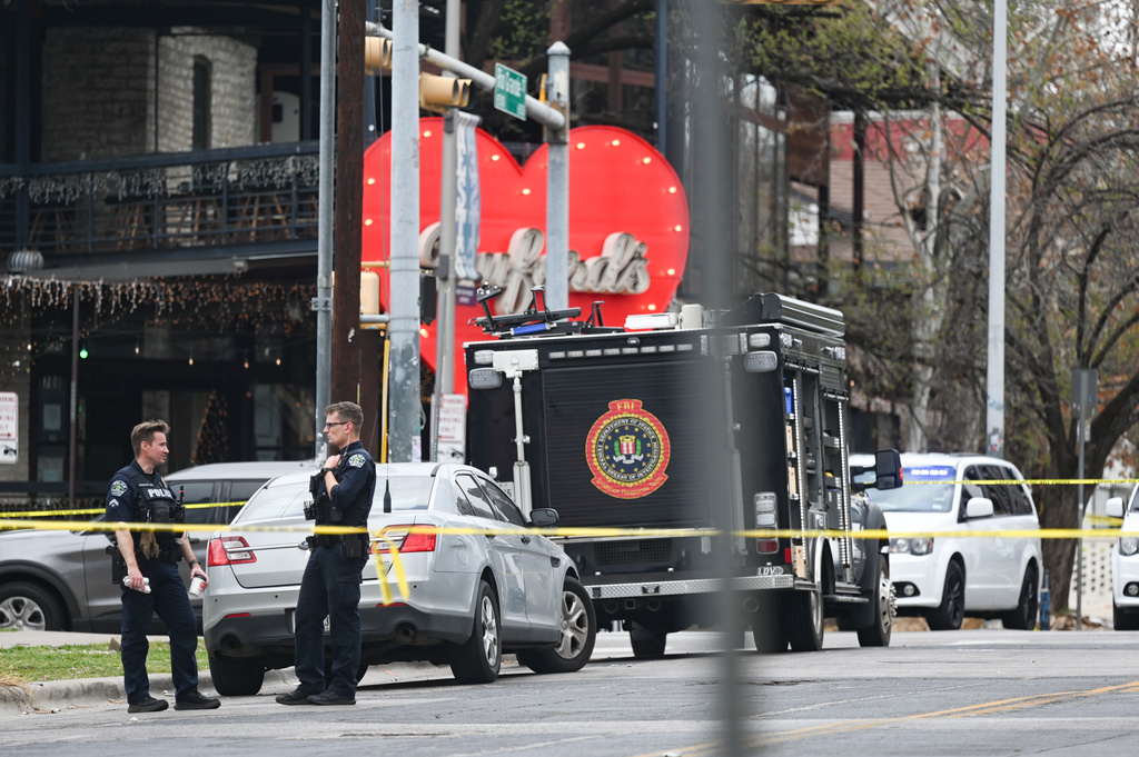 The Austin Police Department and the FBI investigate a shooting at Buford's on 6th Street on Sunday, March 1, 2026, in Austin, Texas.