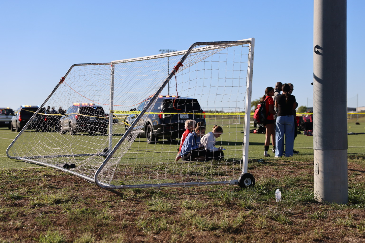 This image provided by KAKE shows police on the scene where a person drove a vehicle through a soccer field during a game in Wichita, Kansas, Saturday, Oct. 17, 2026.