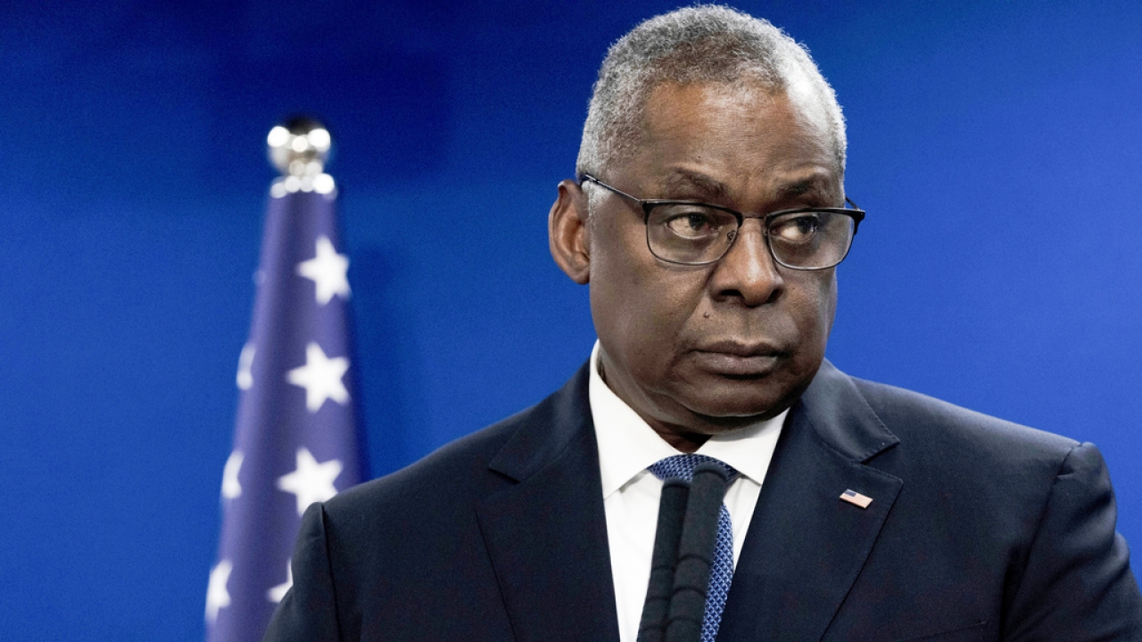 Secretary of Defense Lloyd Austin is seen after a meeting.