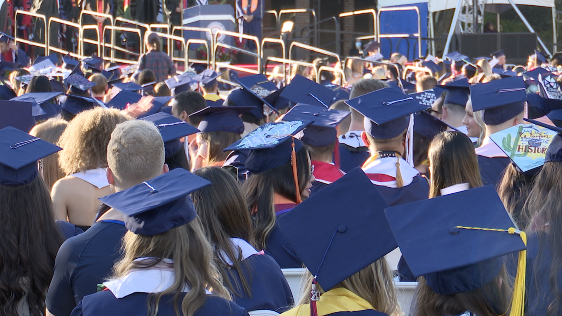Graduates sit at the University of Arizona's 2020 Commencement, held in-person in November 2021.