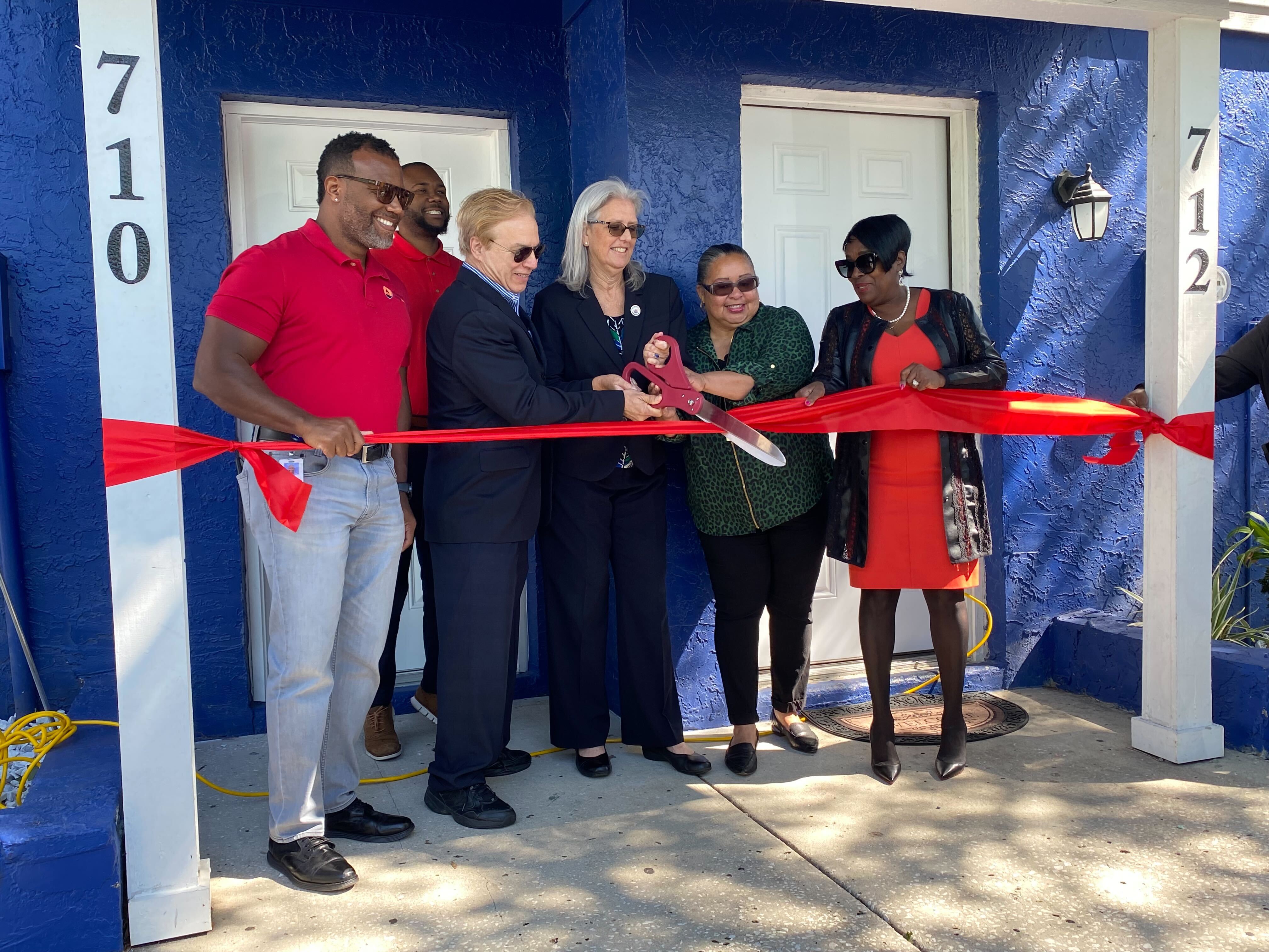 Ribbon cutting at an affordable housing project in East Tampa