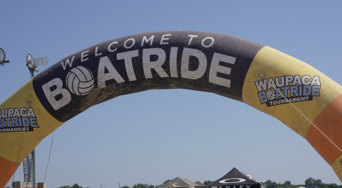 An inflatable arch advertising the Waupaca Boatride.