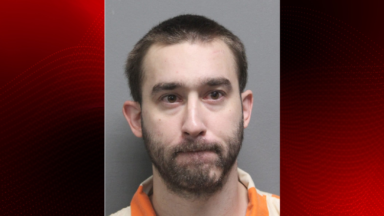 Ian Howard mugshot with background.png
