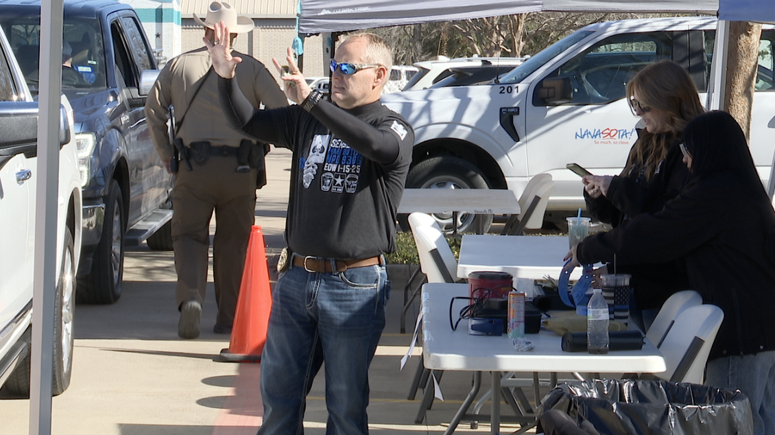 Neighbors come together to honor fallen police sergeant Mark Butler with barbecue fundraiser