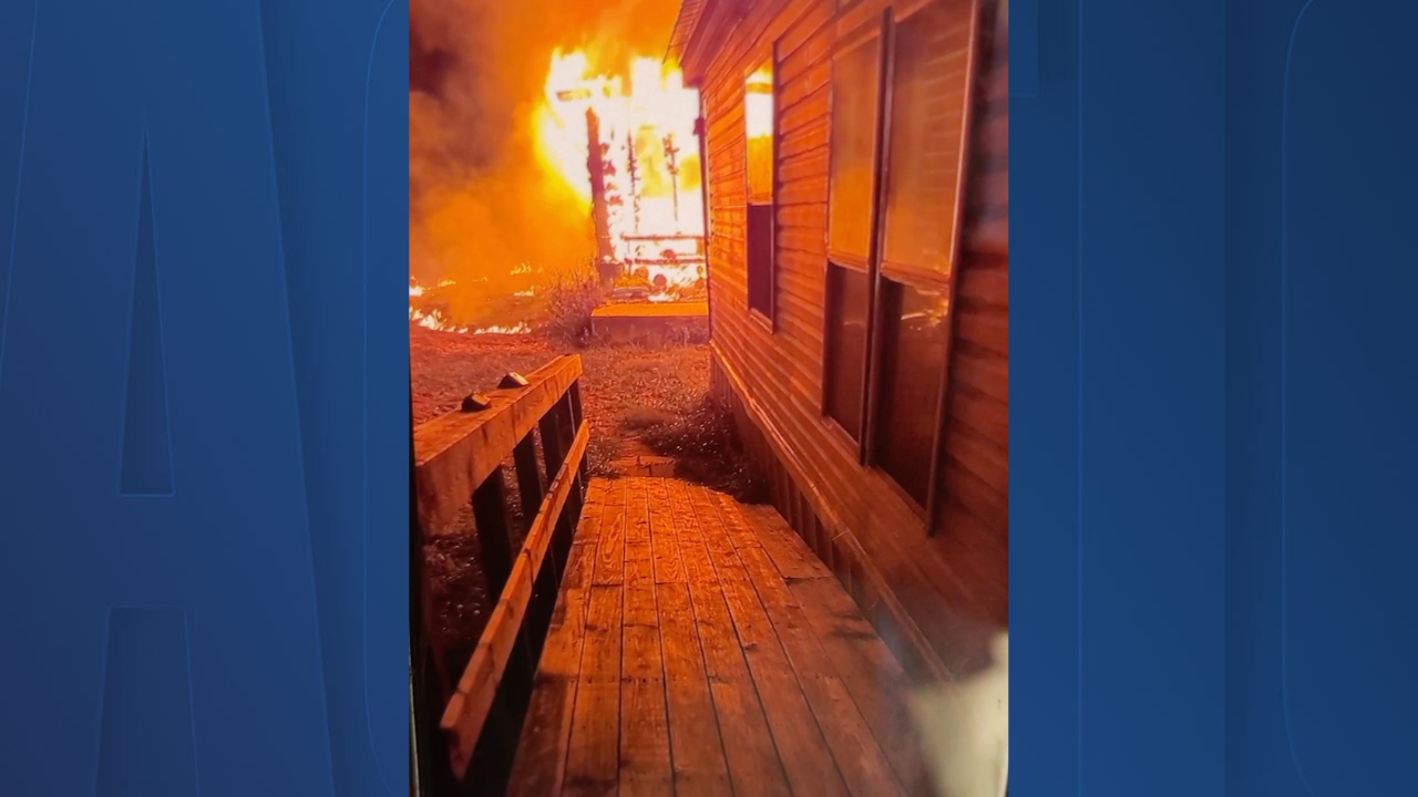 Man goes back into burning house to save family dog 