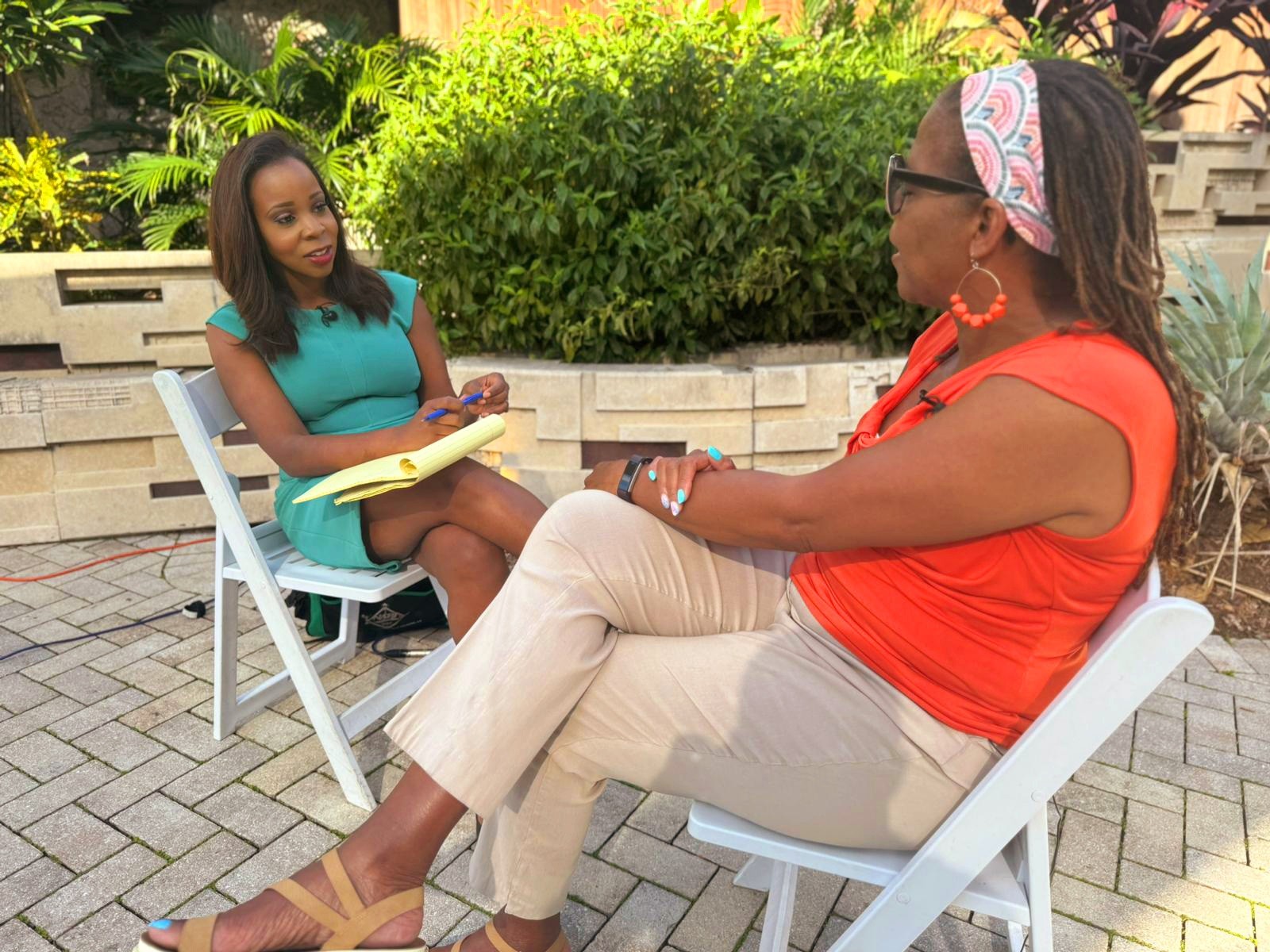 WPTV anchor Hollani Davis speaks to license mental health counselor Terrini Woods on March 15, 2024.jpg