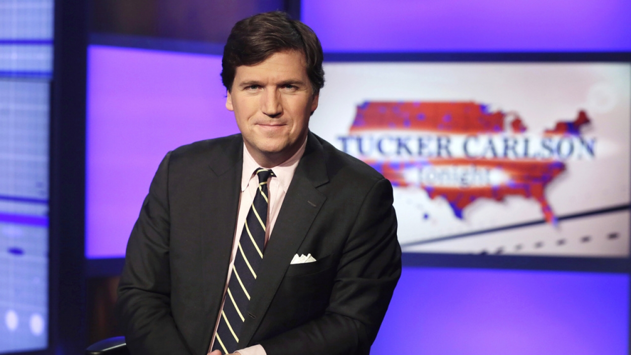Tucker Carlson is shown.