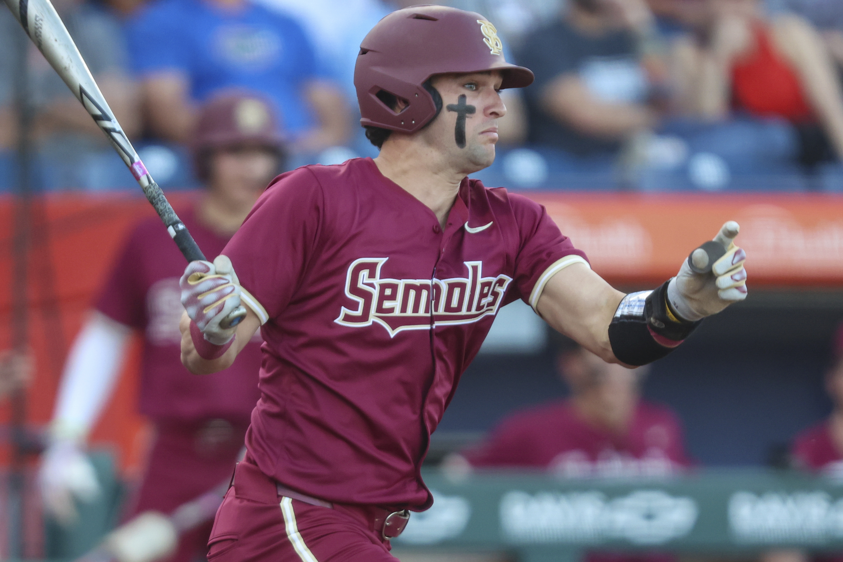 Florida State first baseman Daniel Cantu bats at Florida Gators, March 12, 2024