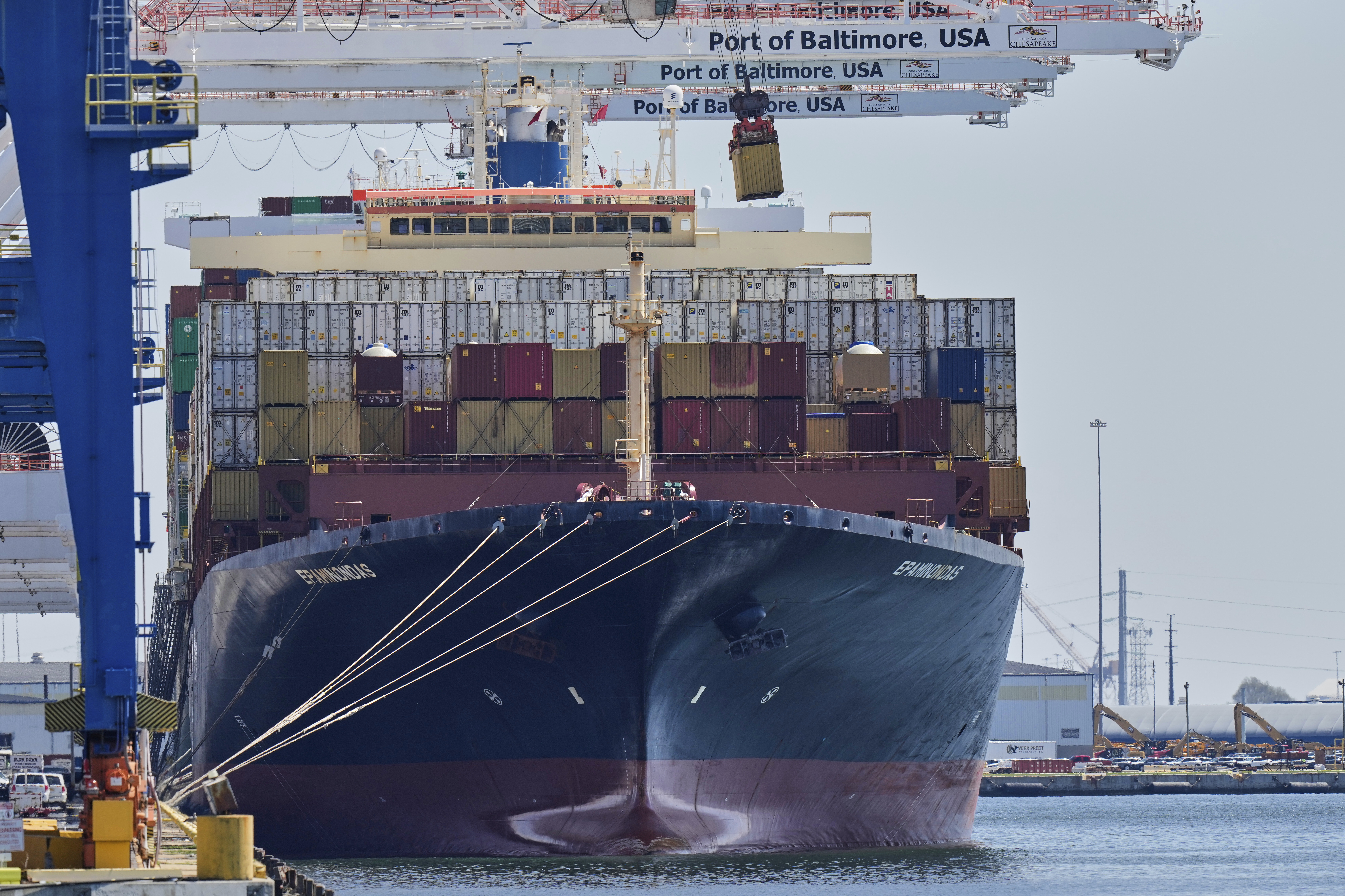 A crane lifts an imports container from the cargo ship Epaminondas while it is docked at the Port of Baltimore, Wednesday, April 9, 2025, in Baltimore. 