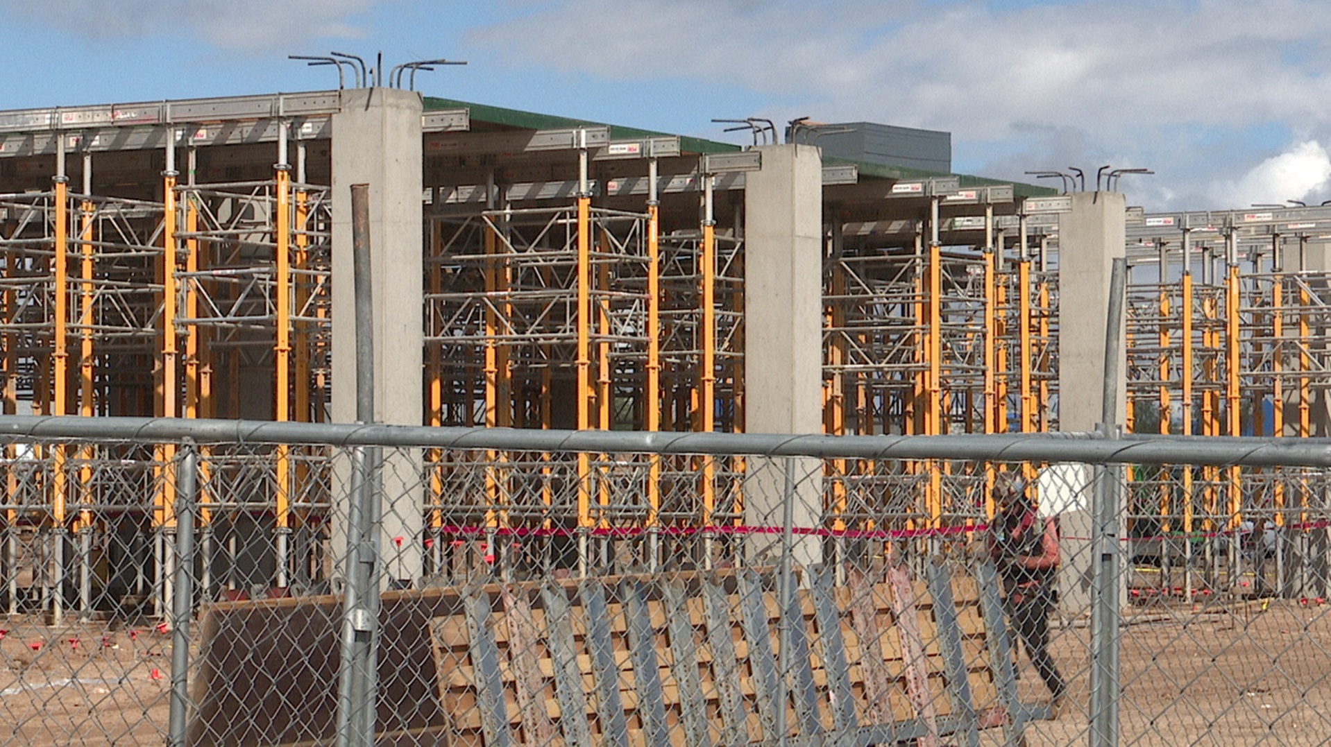 The 'Uptown' project's first building is now going up at the Foothills Mall.