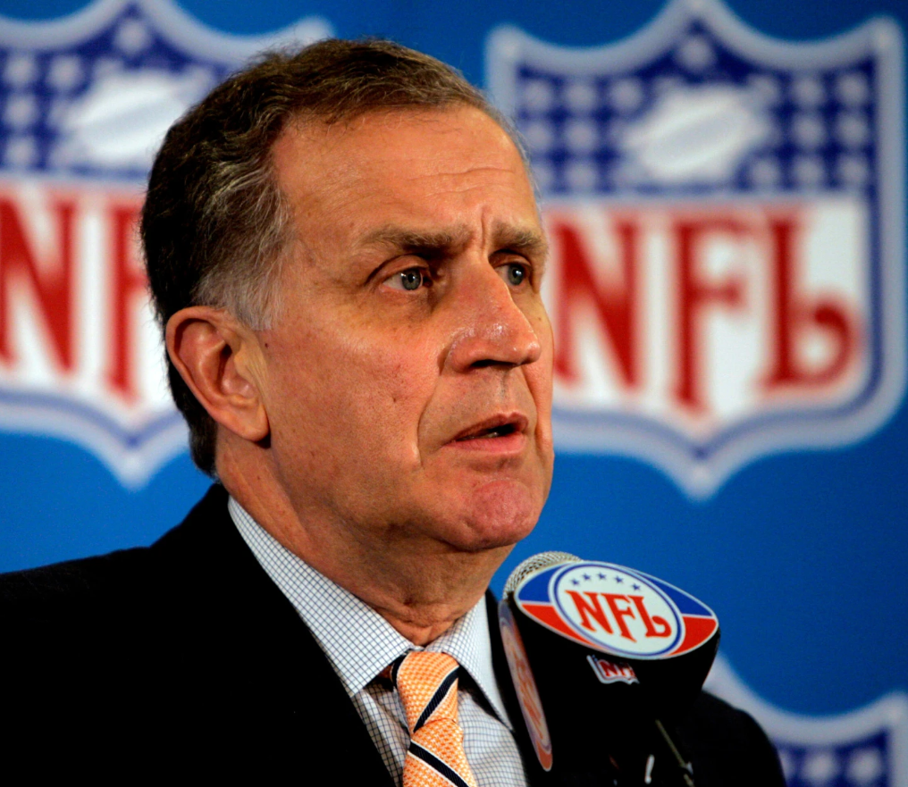 This May 23, 2006, file photo shows then NFL Commissioner Paul Tagliabue responding to questions during a news conference at the conclusion of the National Football League's owners spring meeting in Denver.