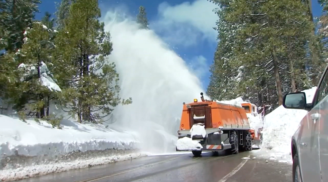 Snow Plow Removes Snow from Road (FILE)
