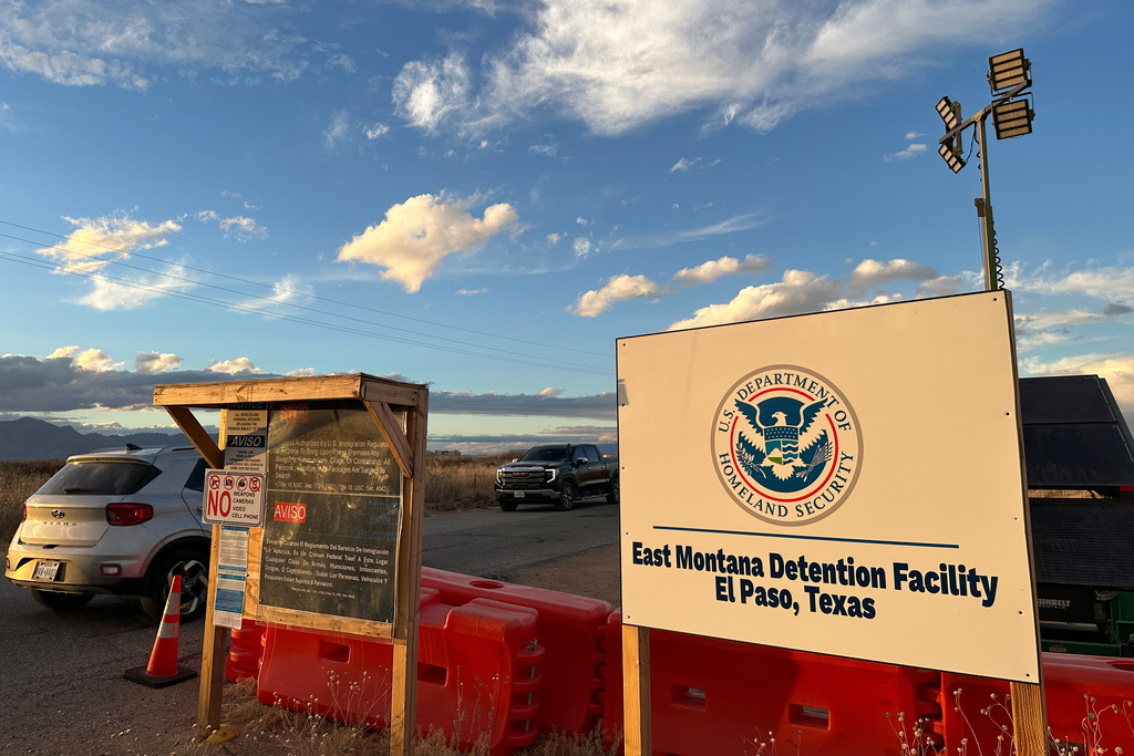 A sign marks the entrance to a series of hardened tents at the Camp East Montana immigrant detention center in the desert at a U.S. Army base on the outskirts of El Paso, Texas, Friday, Feb. 13, 2026.