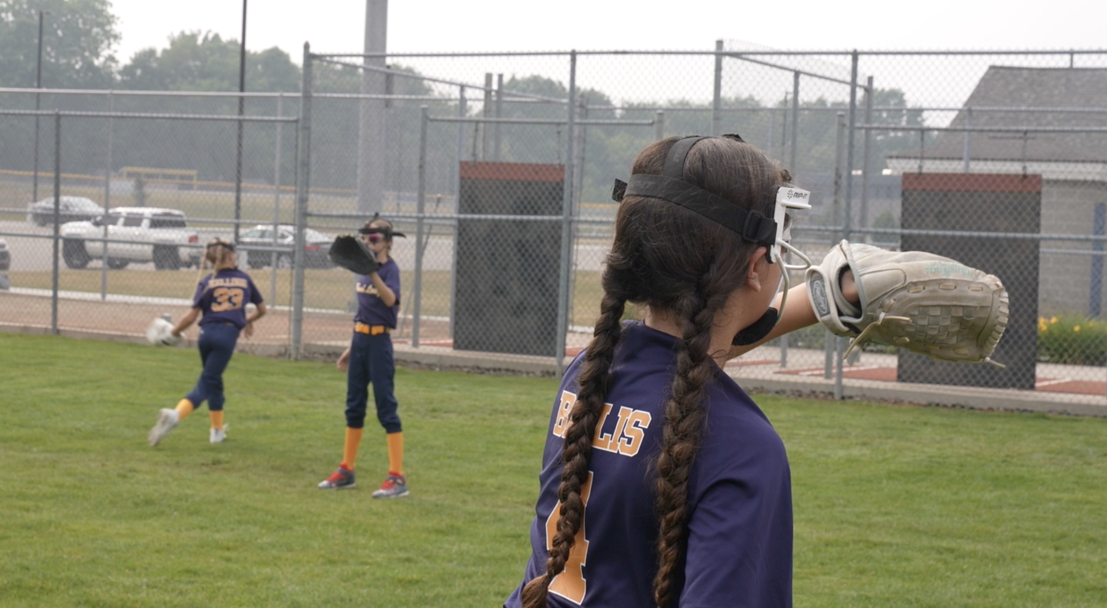 Grand Ledge junior softball warmup