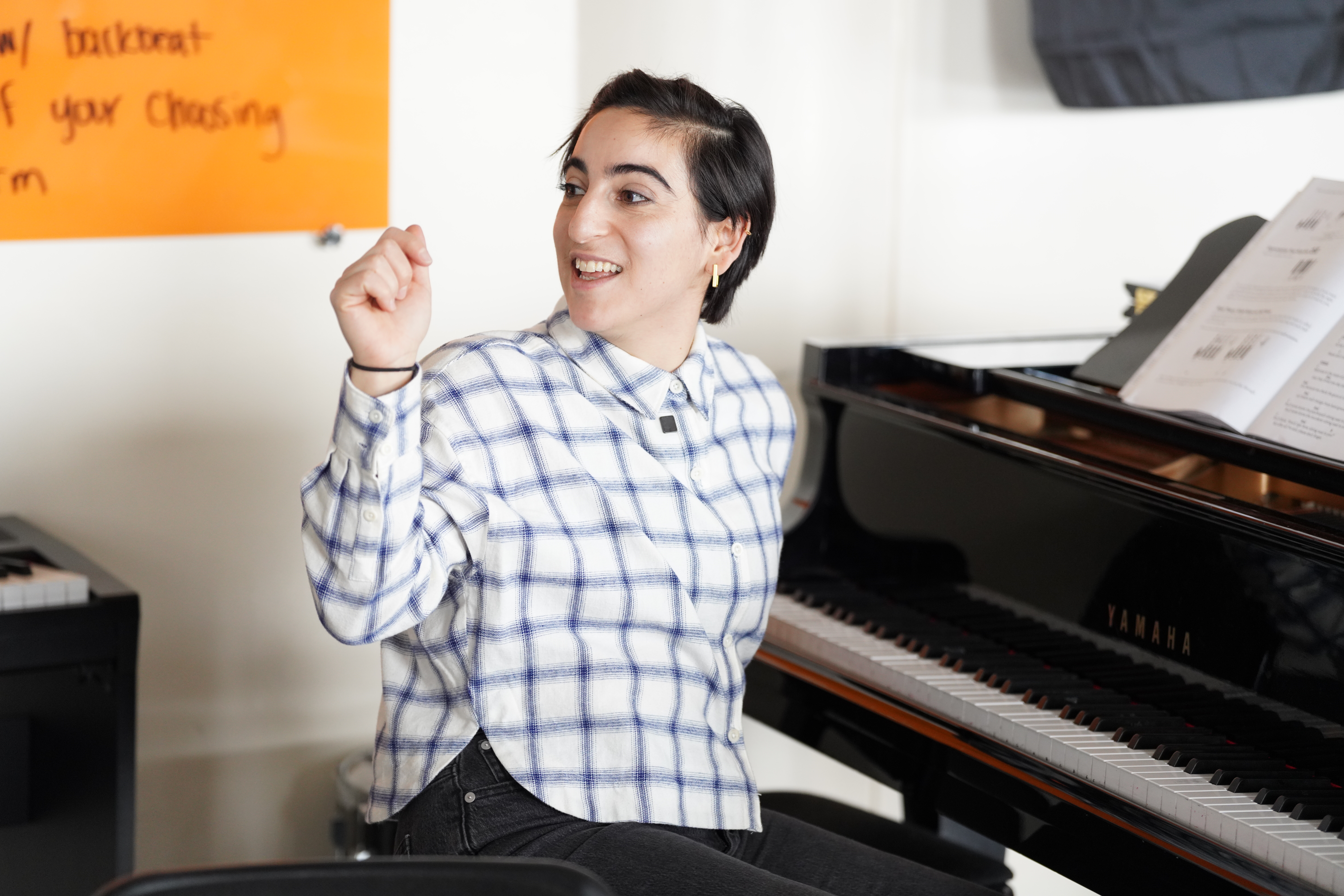 5. Mia Smiling at Piano.jpg