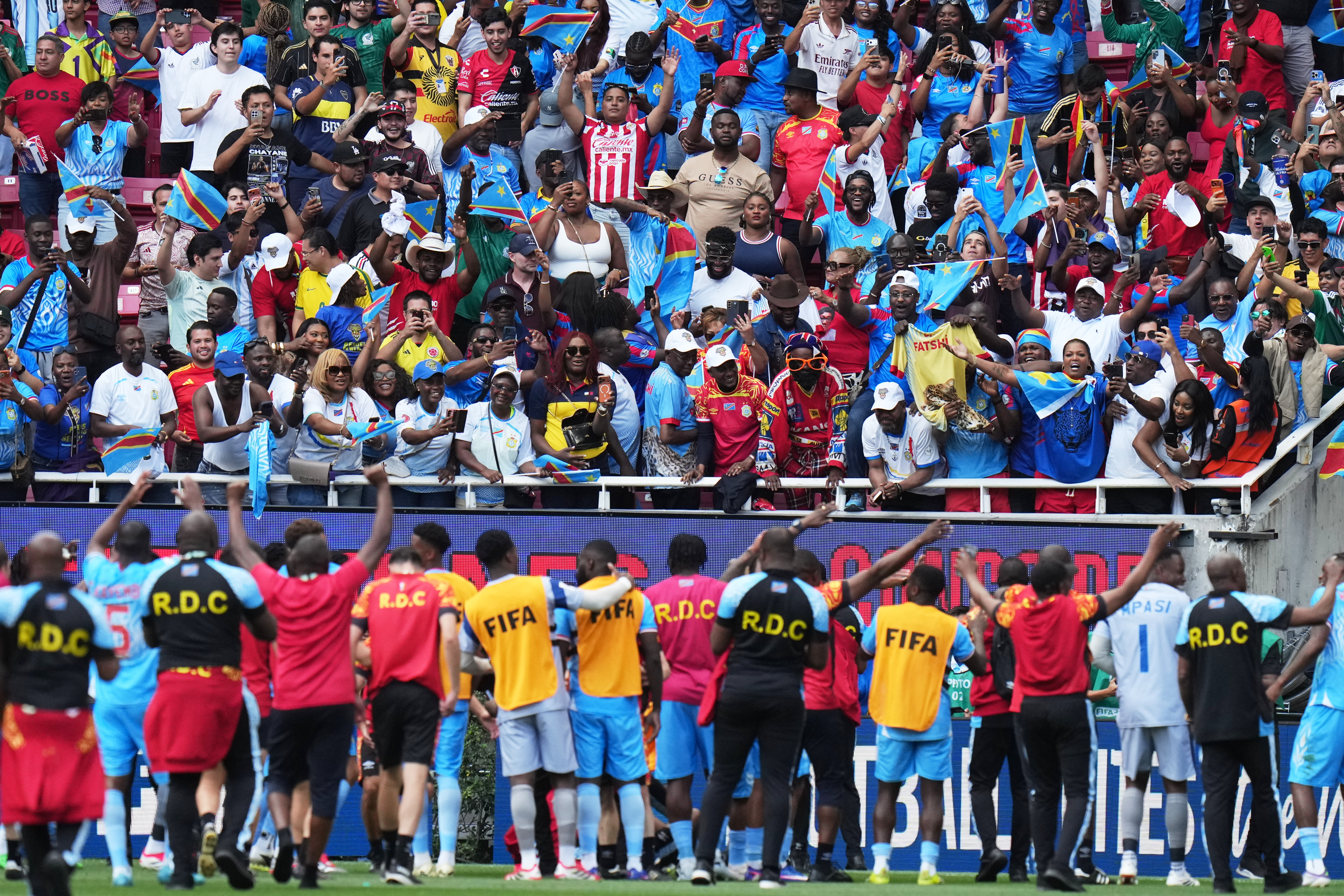 DR Congo's players and fans celebrate at the end of the World Cup playoff final soccer match between DR Congo and Jamaica in Guadalajara, Mexico, Tuesday, March 31, 2026.