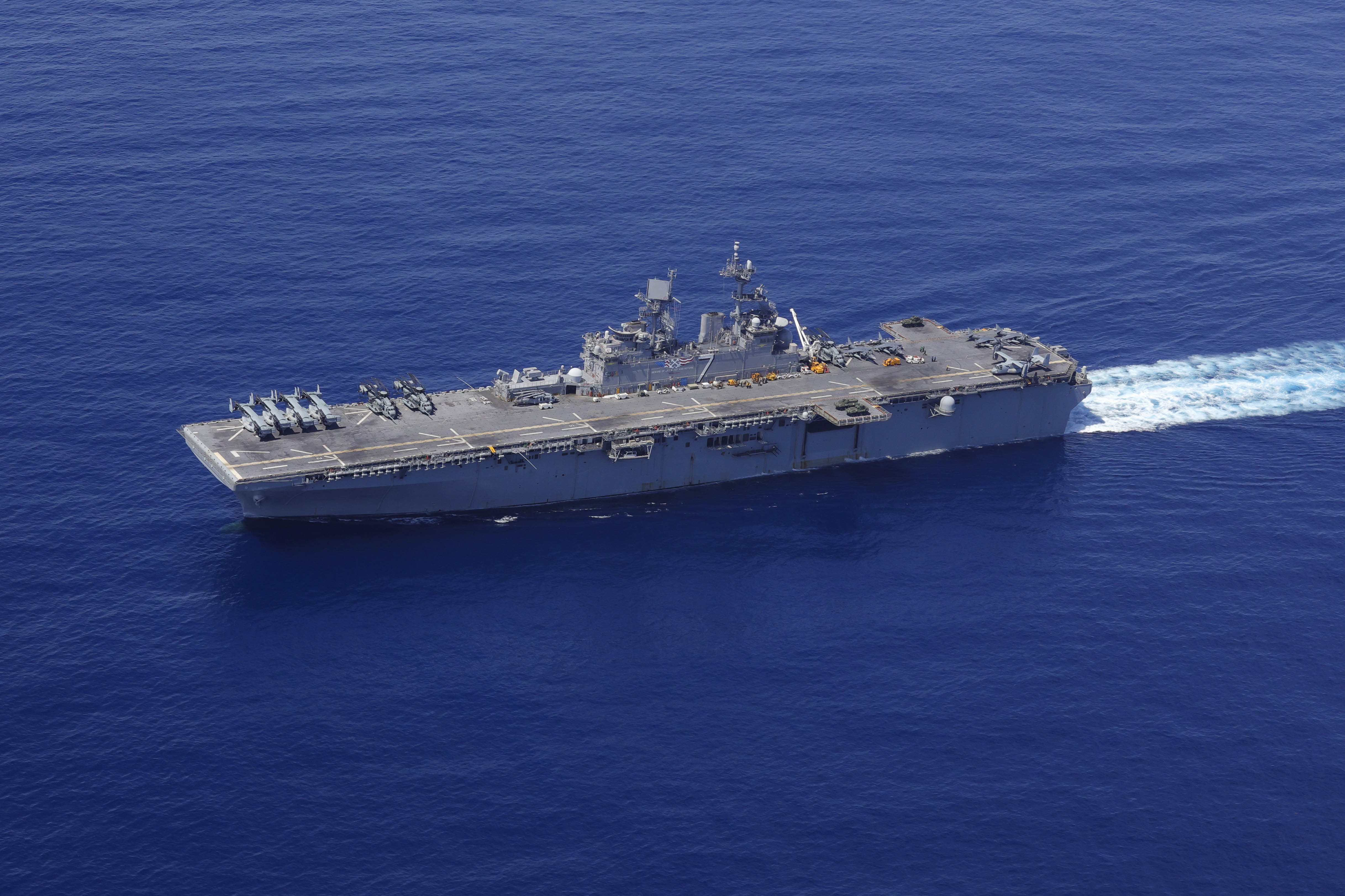 USS Iwo Jima and the USS Fort Lauderdale conduct underway operations