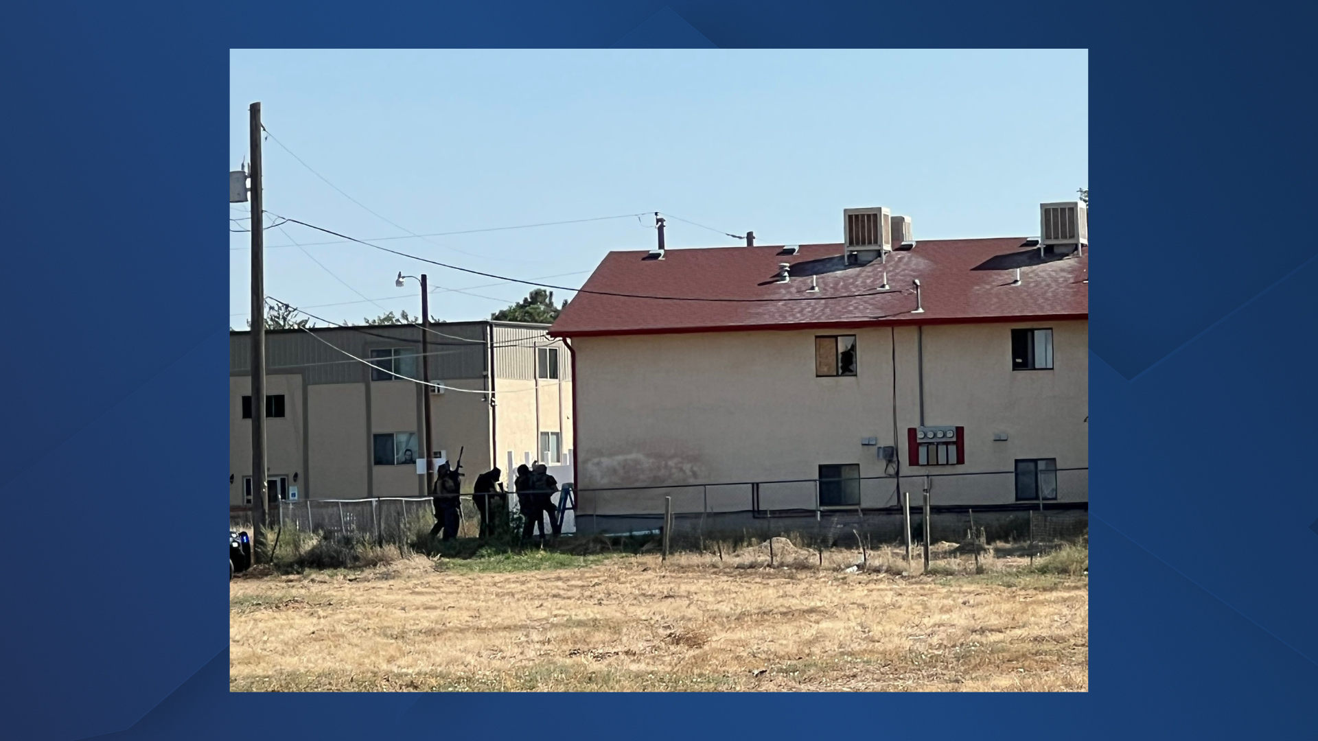 SWAT Team outside the home of a barricaded individual