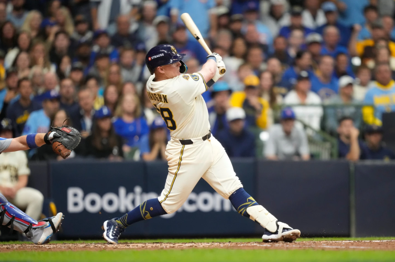 Milwaukee Brewers first baseman Andrew Vaughn (28) hits a solo home run against the Chicago Cubs during the fourth inning of Game 5 of baseball's National League Division Series, Saturday, Oct. 11, 2025, in Milwaukee.