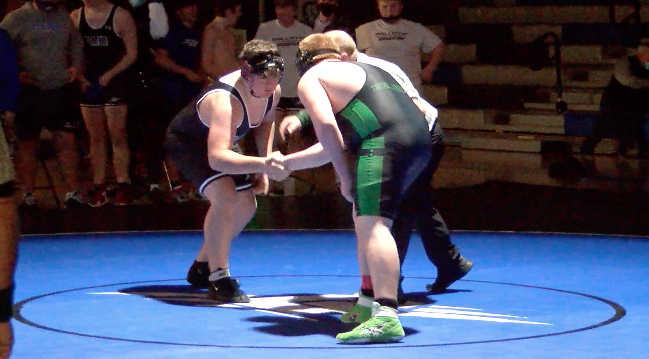 Gallatin's Oakley Woody and Belgrade's Raiden Kline shake hands