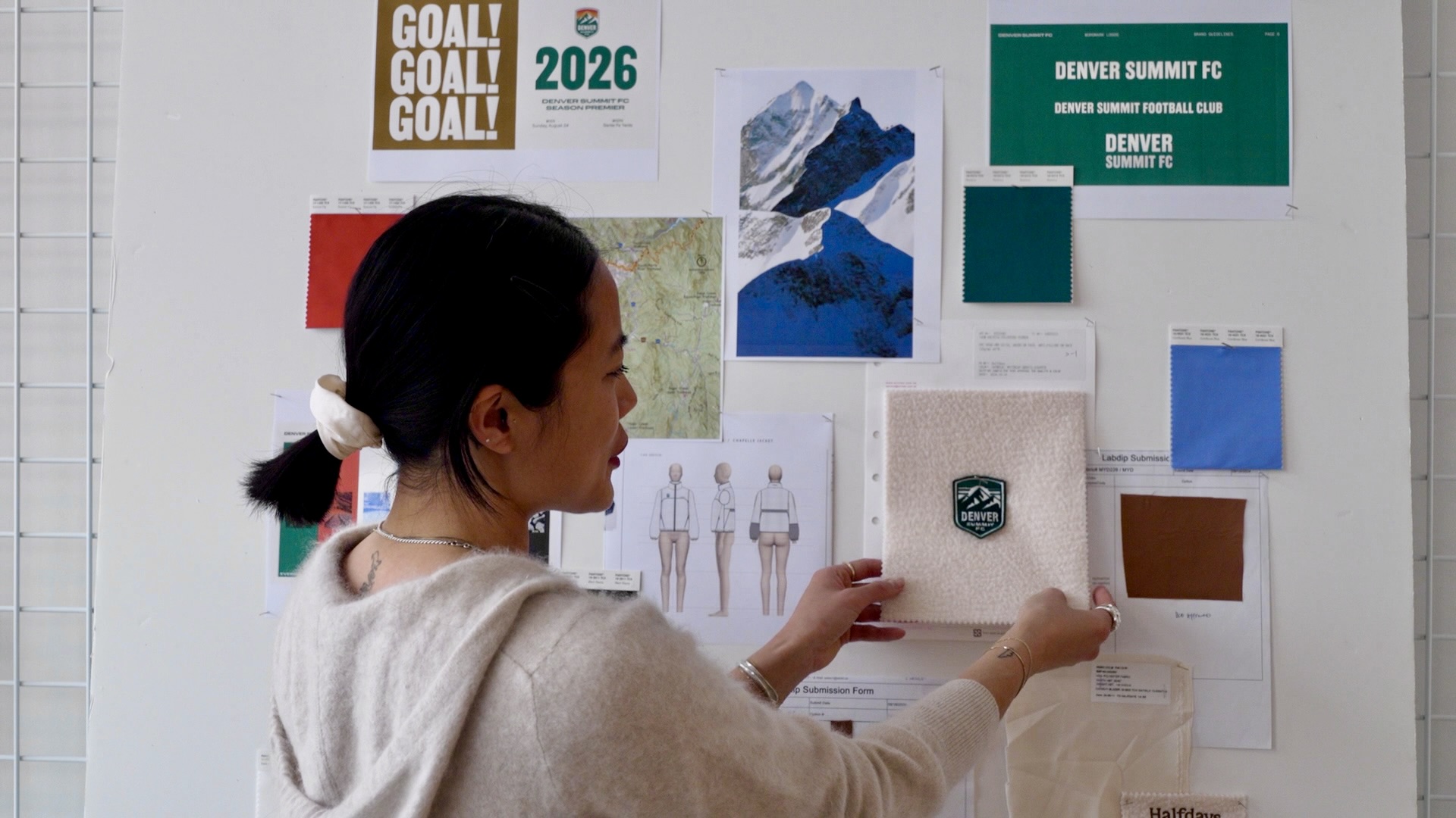 pointing out the design board.jpg