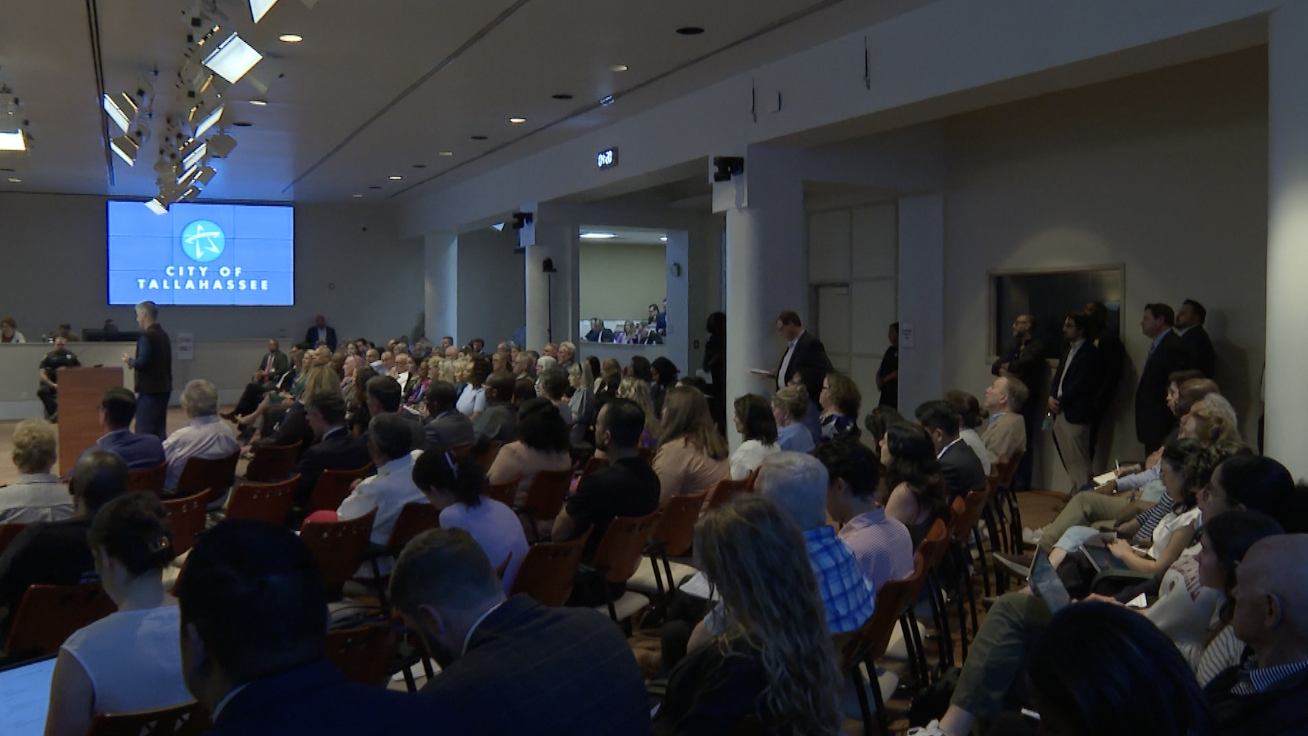 Community members fill City Commission Chamber Wednesday voicing concerns over the City reviewing TMH lease