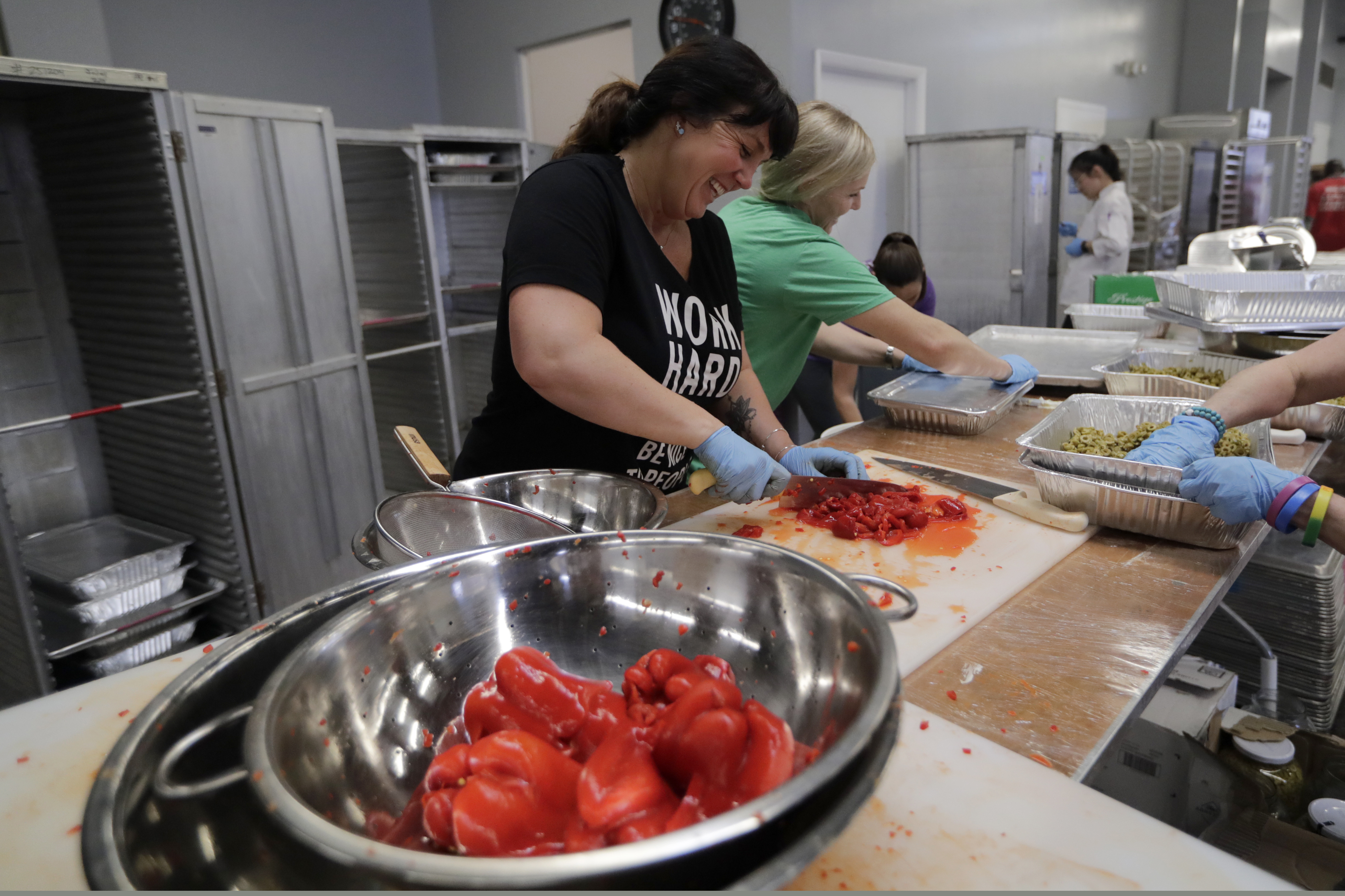 Miami Rescue Mission preps food for the burger bash competition