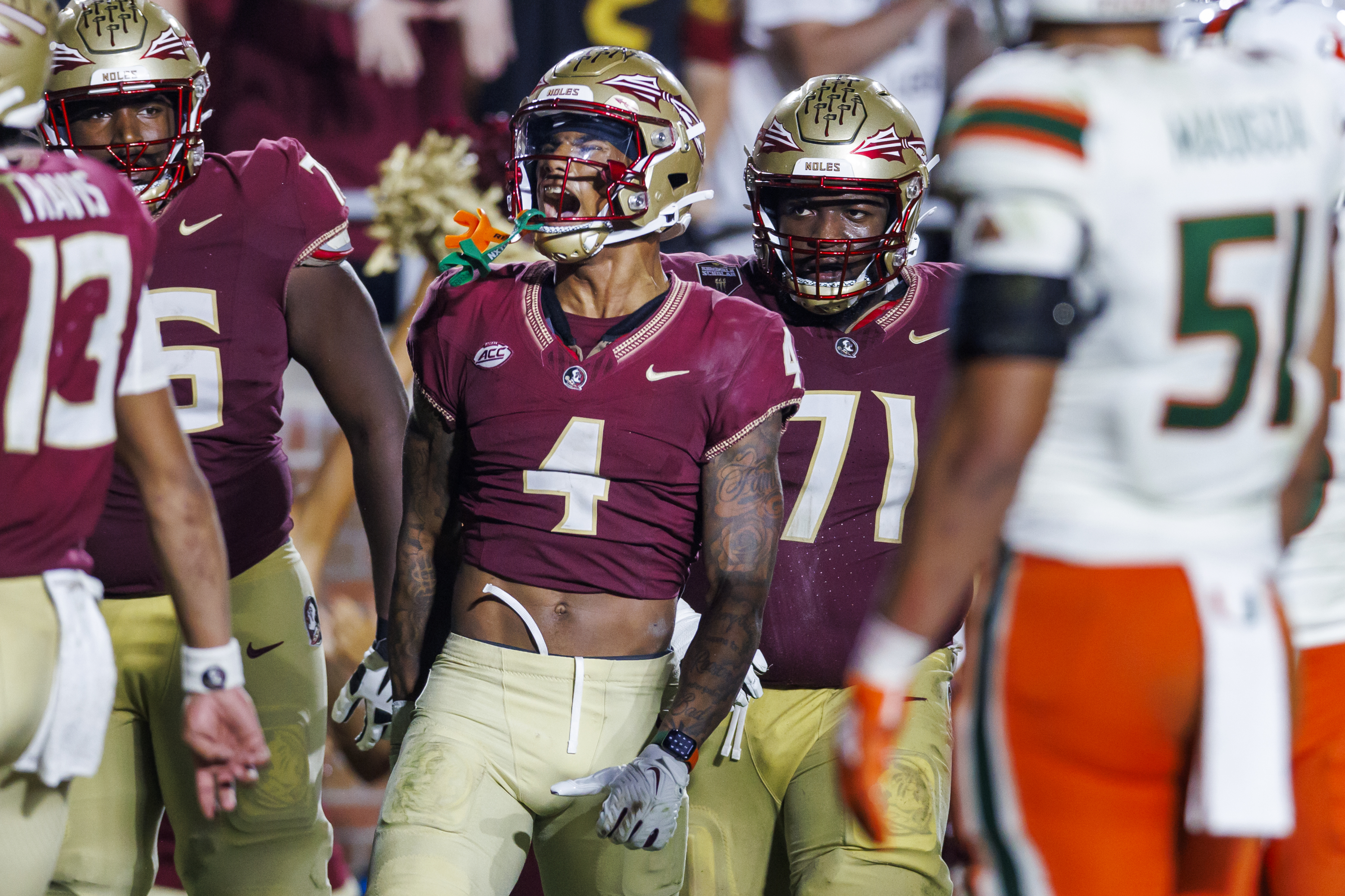 Florida State Seminoles receiver Keon Coleman celebrates touchdown vs. Miami Hurricanes in fourth quarter, Nov. 11, 2023