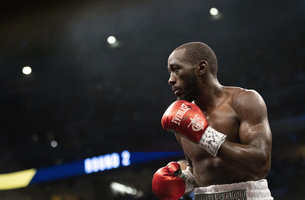 Terence Crawford fights David Avanesyan during a WBO welterweight title boxing bout on Saturday, Dec. 10, 2022, in Omaha, Neb.