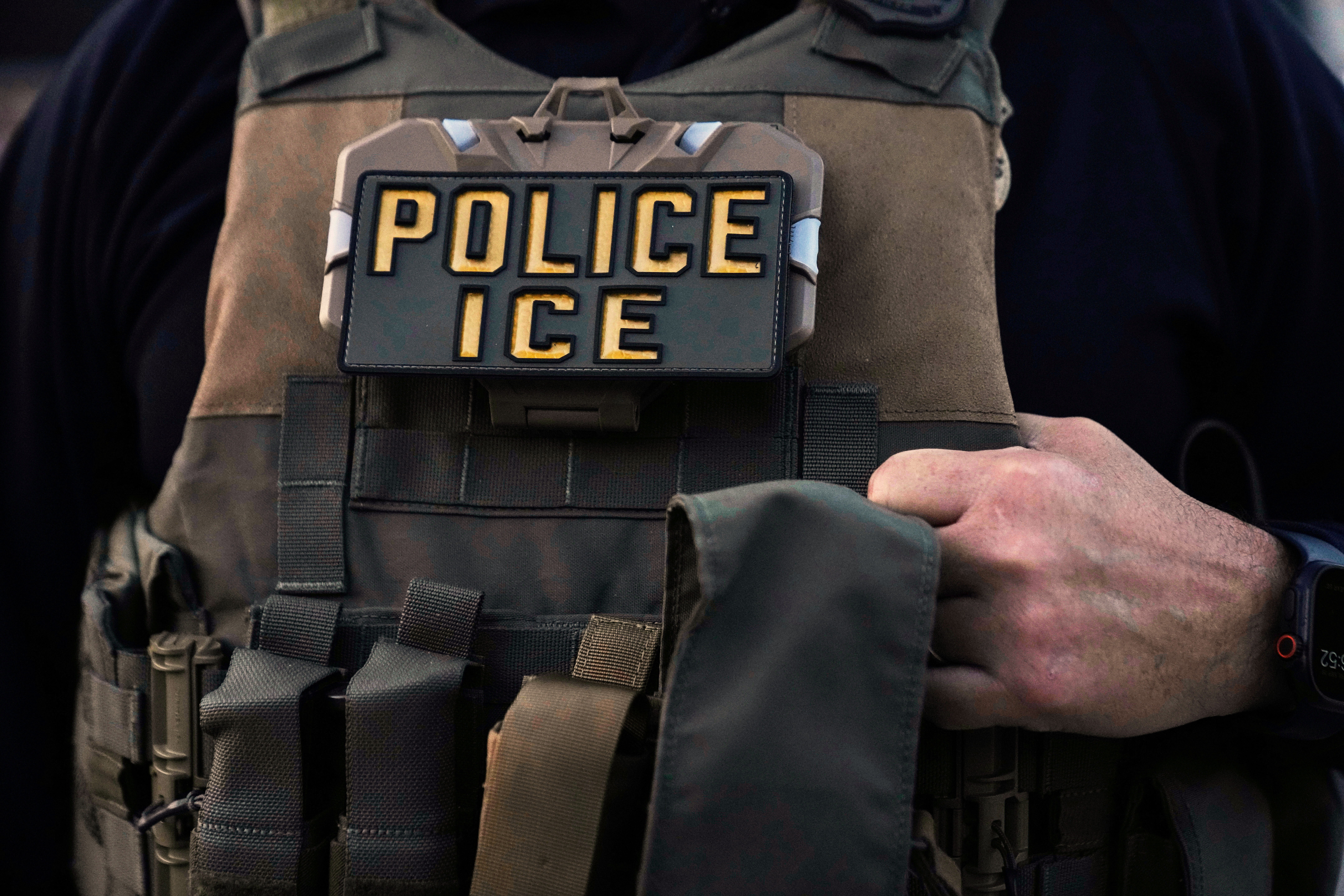 FILE - A U.S. Immigration and Customs Enforcement agent.