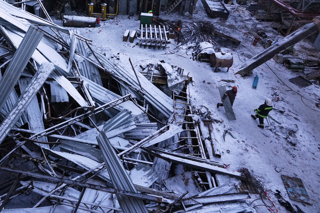 Workers repair the DTEK company's power plant destroyed by a Russian missile attack, at an undisclosed location in Ukraine, Monday, Feb. 9, 2026.