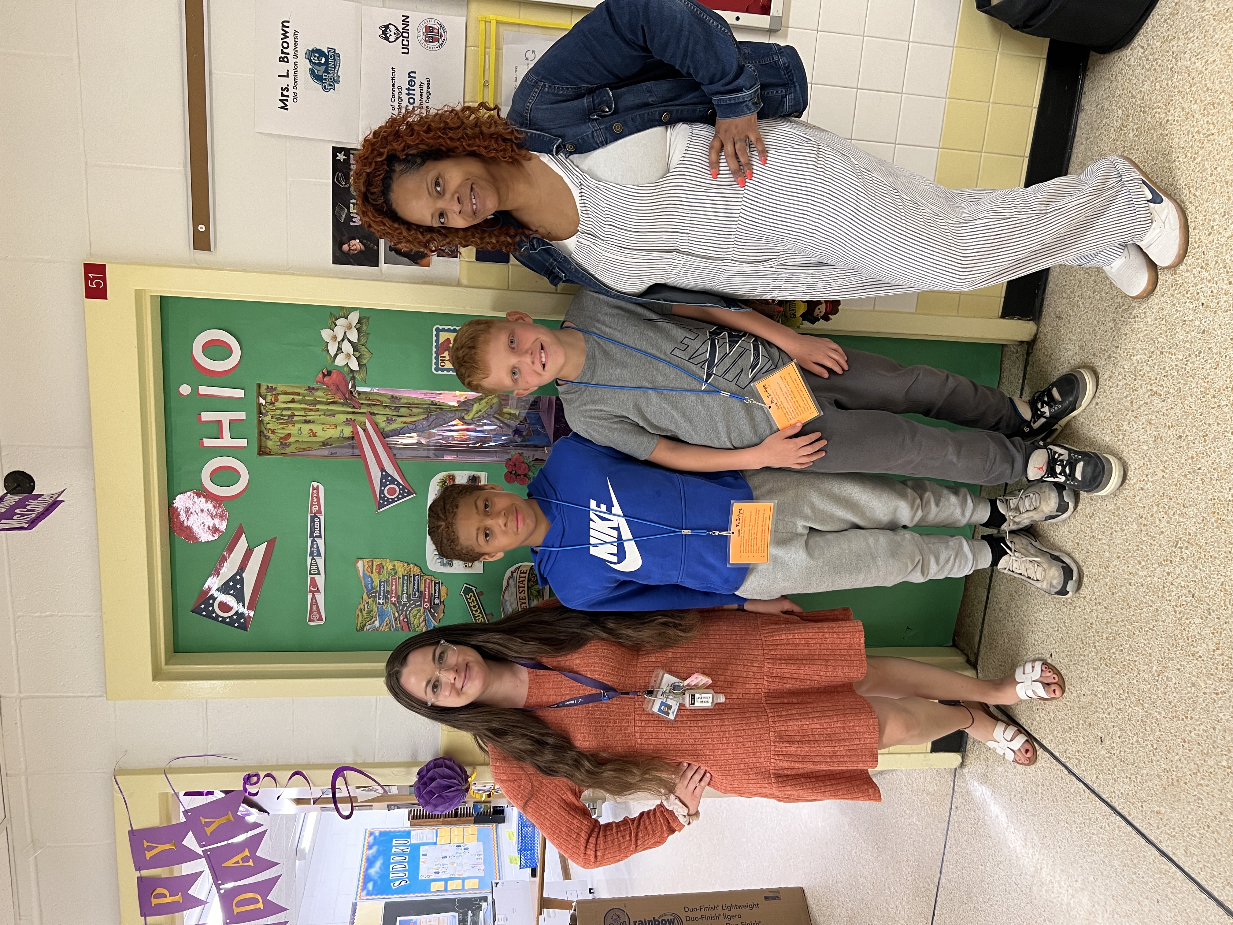 Students and staff decorate doors