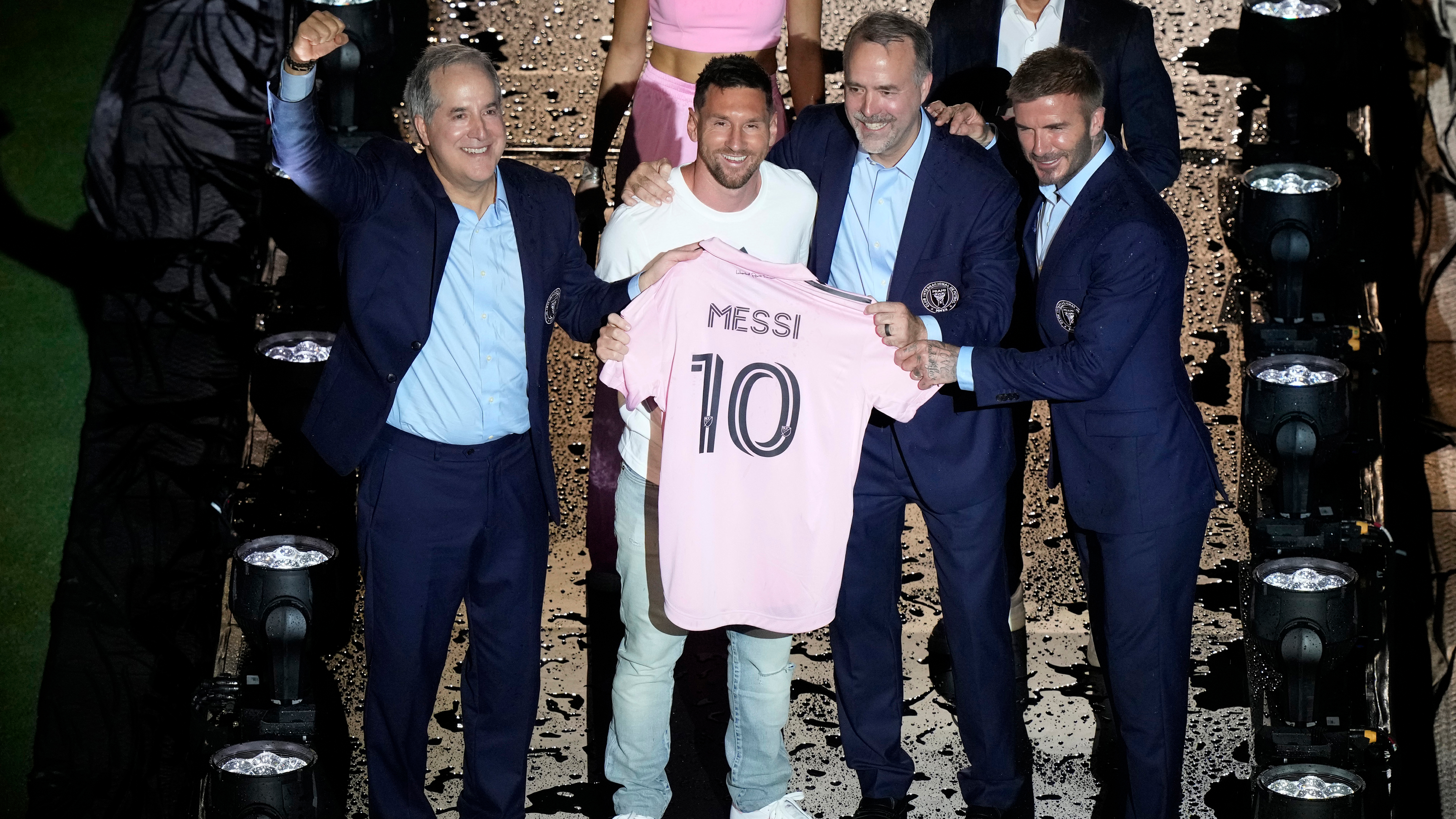 Lionel Messi stands with owners Jorge Mas, left, Jose Mas and David Beckham after he was introduced during a celebration by the team at DRV PNK Stadium, Sunday, July 16, 2023, in Fort Lauderdale, Fla. It comes one day after Messi, Major League Soccer and Inter Miami finalized his signing through the 2025 season.